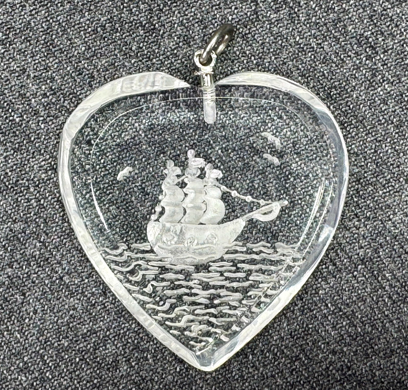 Vintage Reverse Carved Intaglio Lucite Ship Pendant - Heart Shaped. *f: Vintage Reverse Carved Intaglio clear Lucite Ship Pendant - Heart Shaped. Unmarked For measures please refer to the pictures taken with a measuring tape. Weight: 6 Grams. IN HOUSE FLAT SHIPPING & HAND