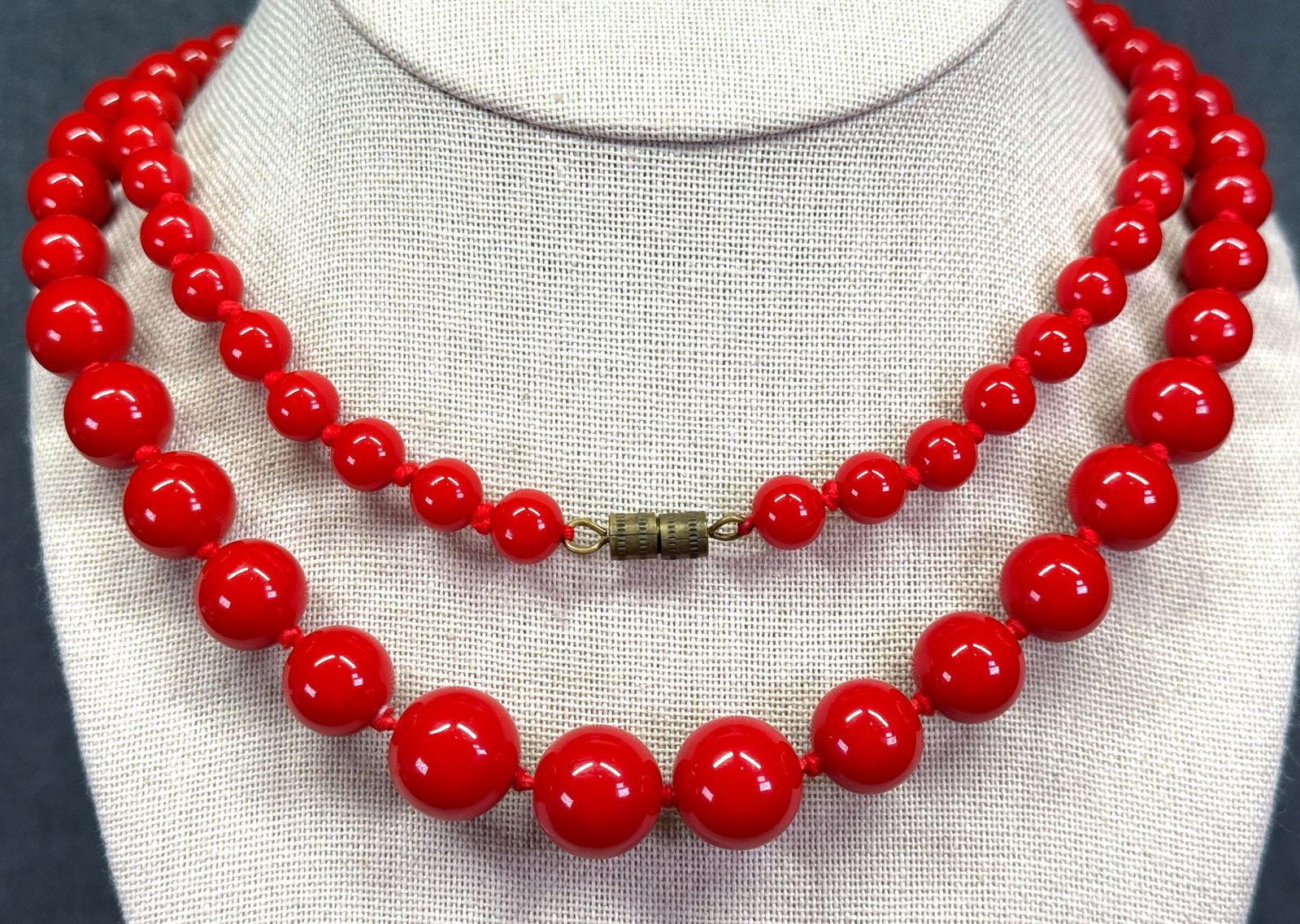 Vintage hand knotted in between red lucite beads graduated necklace . *d: Vintage AB crystal, glass & lucite beads 2 strands necklace. Filigree gold-toned clasp. Unmarked. For measures please refer to the pictures taken with a measuring tape. Weight: 40 Grams IN HOUSE FLAT 