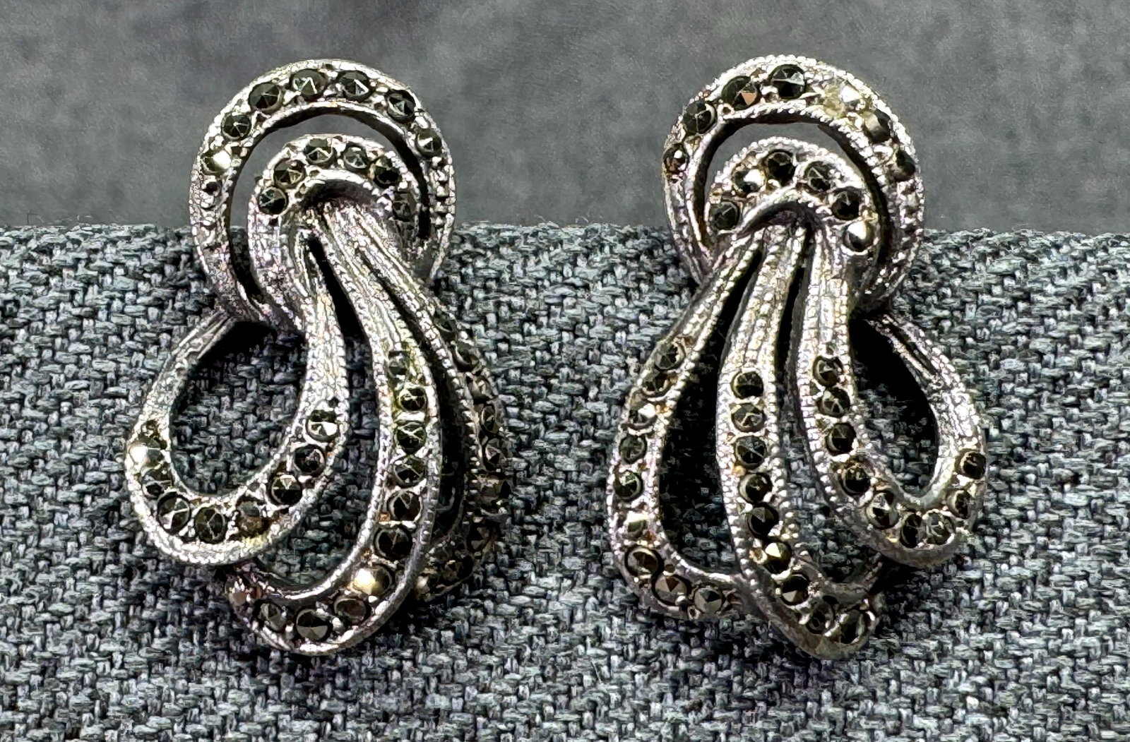 Antique Art Deco Openwork Stud Earrings. Sterling Silver, Marcasite. *h: Antique European Art Deco Openwork Swirl Ribbon Stud Earrings. Sterling Silver, Marcasite. Marked Ste. For measures please refer to the pictures taken with a measuring tape. Weight:5.20 Grams. IN HOUS