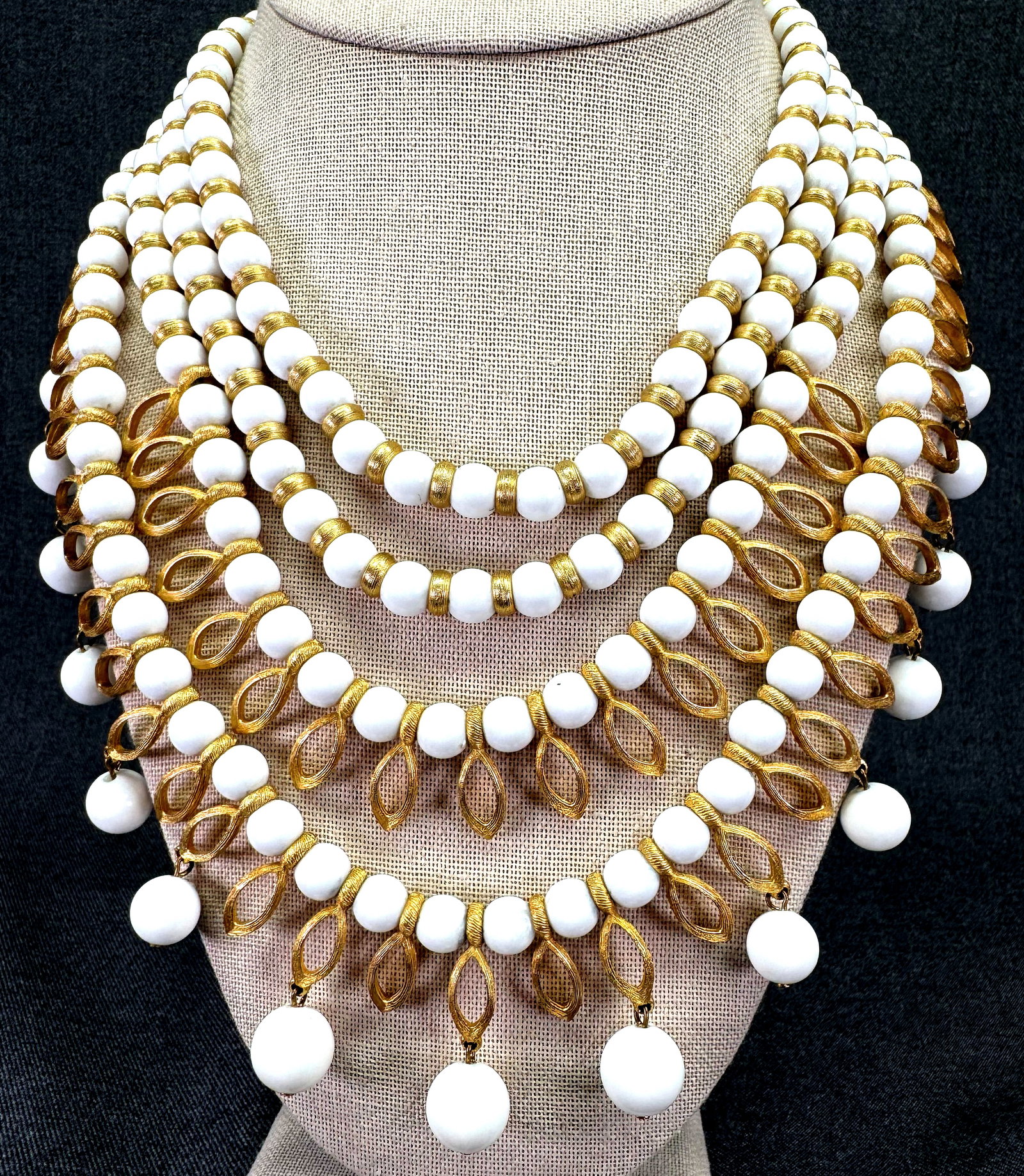 Vintage Signed Kramer White Lucite Bib Statement Necklace. Textured Gold-toned. *h: Vintage Signed Kramer White Lucite Bib Statement Necklace. Textured Gold-toned. Marked on the clasp. For measures please refer to the pictures taken with a measuring tape. Weight: 150 Grams. IN HOUSE 