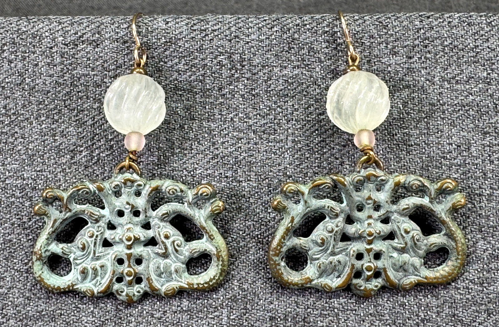 Vintage Artisan Boho Dual Dragon Filigree Earrings. Green Verdigris Patina Brass, Glass Bead. *h: Vintage Artisan Boho Dual Dragon Filigree Earrings. Green Verdigris Patina Brass, Glass Bead. Unmarked. For measures please refer to the pictures taken with a measuring tape. Weight: 20 Grams. IN HOUS