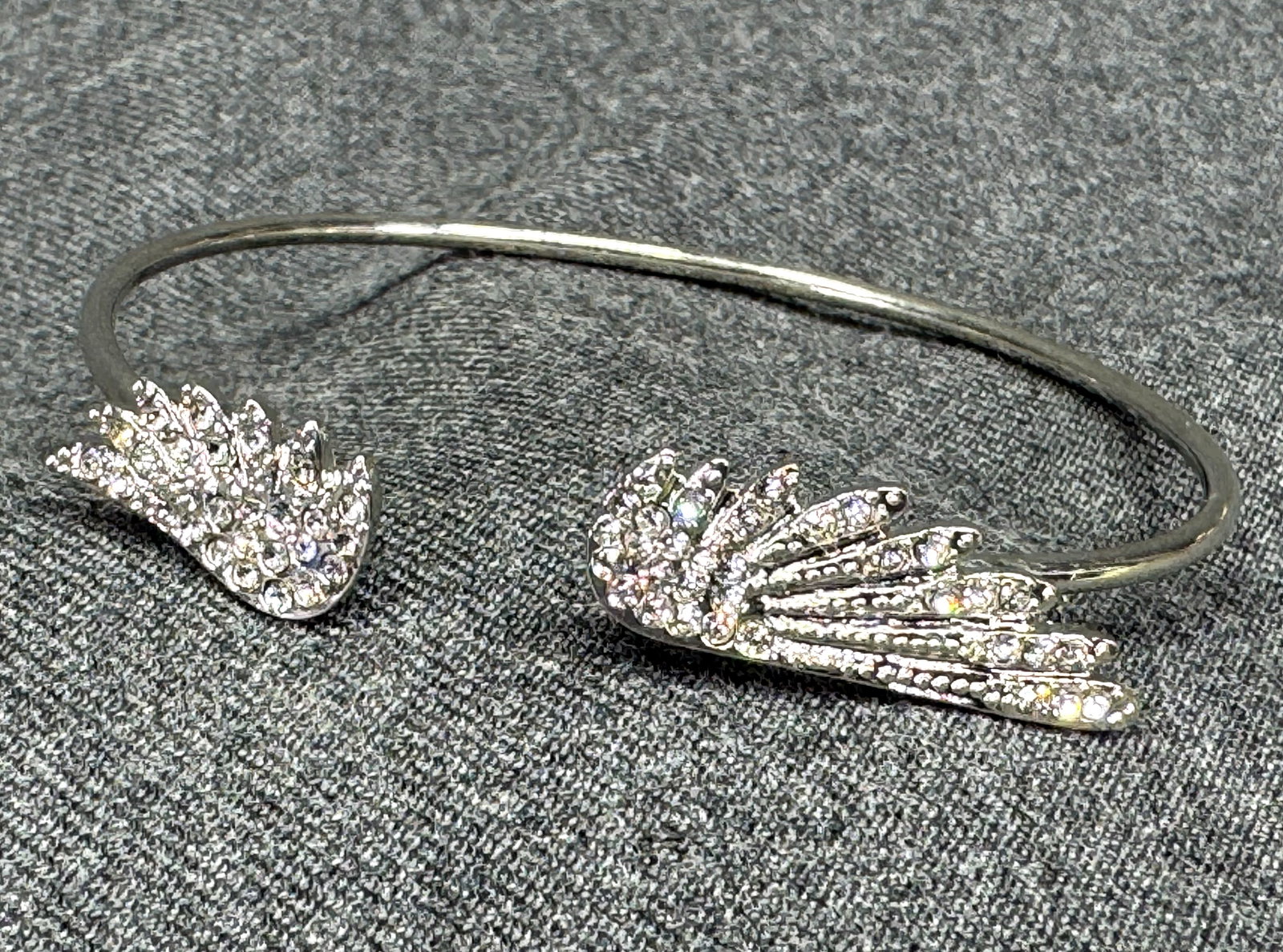 Crystal Pavé Guardian Angel Wing Cuff Bracelet. Silver-tone. *f: Crystal Pavé Guardian Angel Wing Cuff Bracelet. Silver-tone. Unmarked. For measures please refer to the pictures taken with a measuring tape. Weight: 14 Grams. IN HOUSE FLAT SHIPPING & HANDLING C