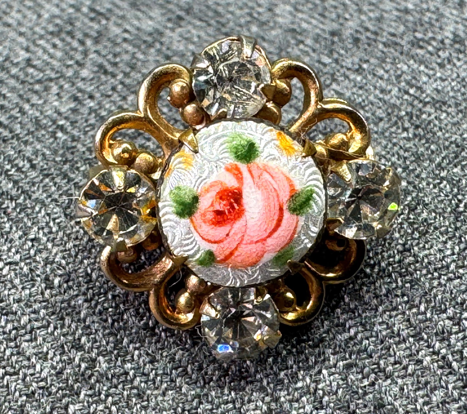 Vintage Guilloche Enamel and Rhinestone Rose Miniature Brooch Pin. Gold-tone. *f: Vintage Guilloche Enamel and Rhinestone Rose Miniature Brooch Pin. Gold-tone. Unmarked. For measures please refer to the pictures taken with a measuring tape. Weight: 3 Grams. IN HOUSE FLAT SHIPPING &