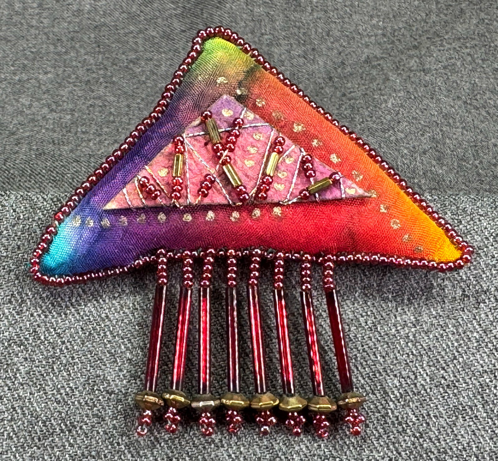Signed Gust Art Textile Brooch Pin. Painted stuffed silk, glass beads. *f: Signed Gust Art Textile Brooch Pin. Painted stuffed silk, glass beads. For measures please refer to the pictures taken with a measuring tape. Weight: 10 Grams. IN HOUSE FLAT SHIPPING & HANDLING COST W
