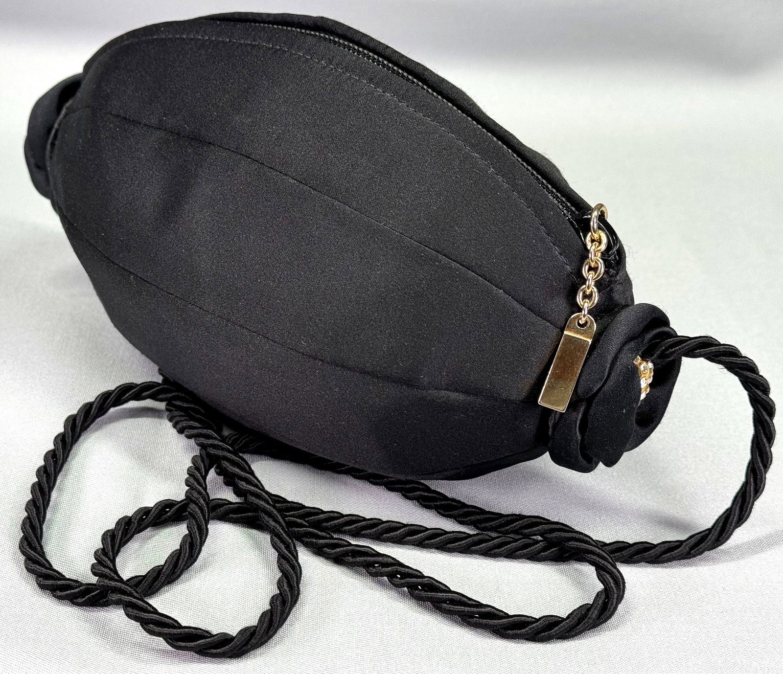 Vintage 90s Italian Charles Jourdan black silk candy shaped bag. Rhinestones flowers sides: IN HOUSE FLAT SHIPPING & HANDLING COST WITHIN ALL THE U.S. : 12 To bypass LiveShipping, and use our In-House shipping service for 12 or shipping combined for multiple lots, please select “Arrang