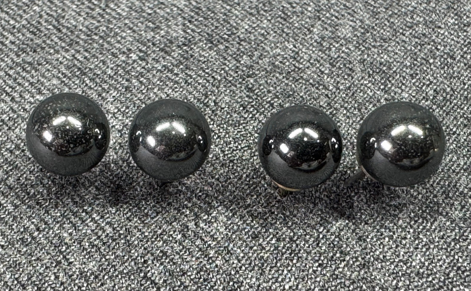 Vintage hematite bead ball silver-toned metal stud earrings. 2 pairs. *b: Vintage hematite bead ball silver-toned metal stud earrings. 2 pairs. Unmarked. For measures please refer to the pictures taken with a measuring tape. Weight: 6 Grams. IN HOUSE FLAT SHIPPING & HANDLIN