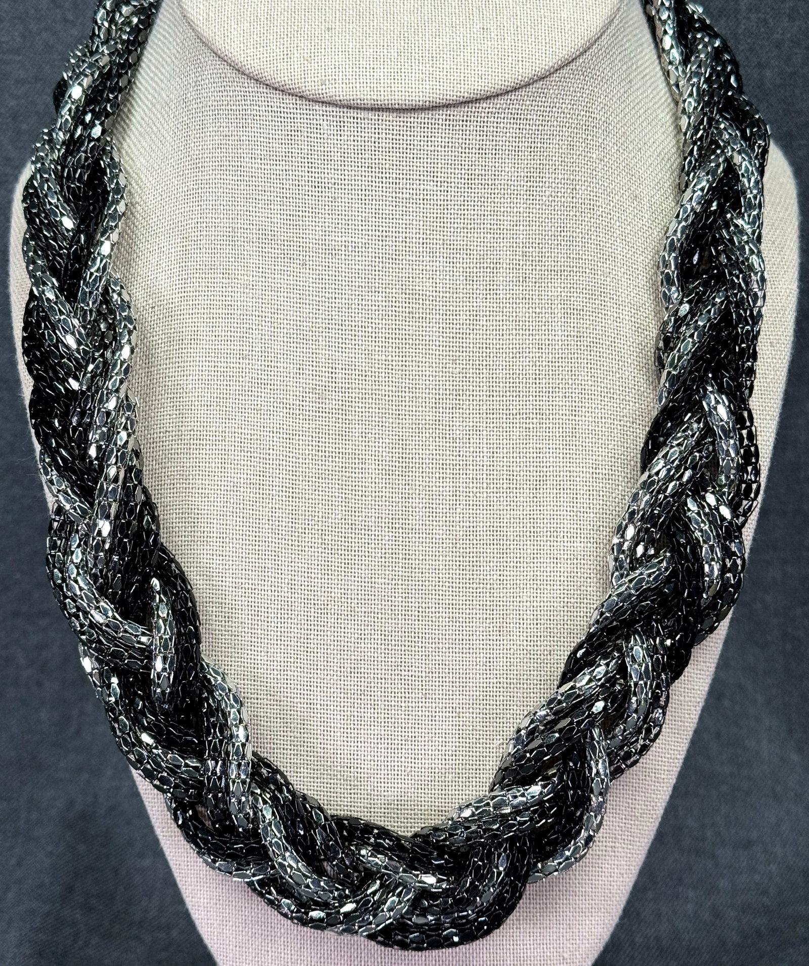Vintage silver-toned & black mesh chain braided necklace: Vintage silver-toned & black mesh chain braided necklace. Unmarked. For measures please refer to the pictures taken with a measuring tape. Weight: 67 Grams. IN HOUSE FLAT SHIPPING & HANDLING COST WITH