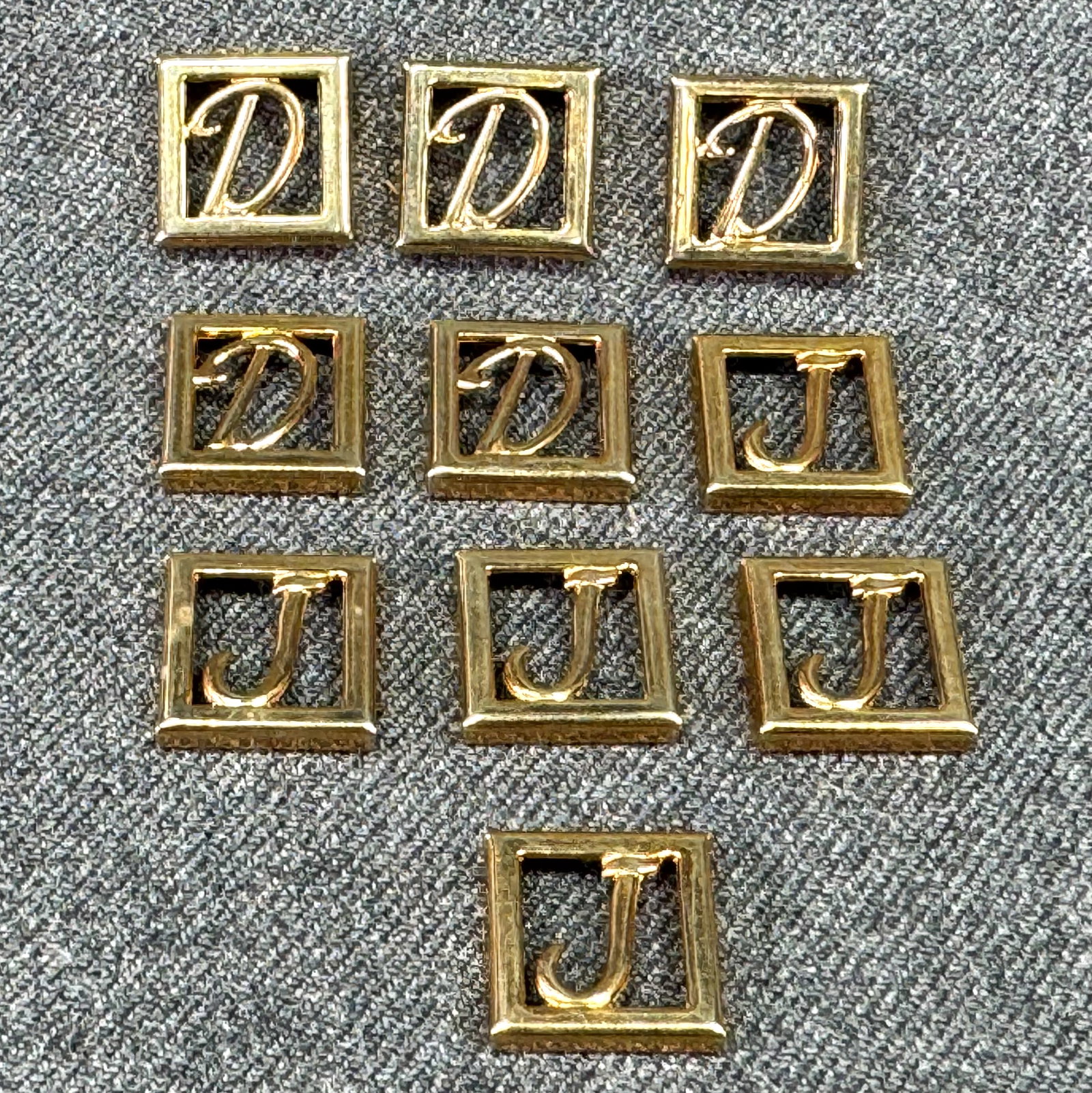 Vintage letter J & D initial gold-toned appliques embellisments. Lot of 10: Vintage letter J & D initial gold-toned appliques embellisments. Lot of 10. Unused. For measures please refer to the pictures taken with a measuring tape. Weight: 11 Grams. IN HOUSE FLAT SHIPPING & HA