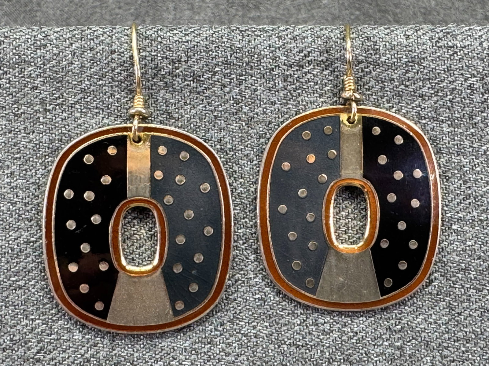 Vintage 1980s Laurel Burch Polka Dot Dangle Hook Earrings. Retired. *J: Vintage 1980s Laurel Burch Polka Dot Dangle Hook Earrings. Retired. Two shades black & red enamel, Gold-tone. For measures please refer to the pictures taken with a measuring tape. Weight: 14 Grams. I