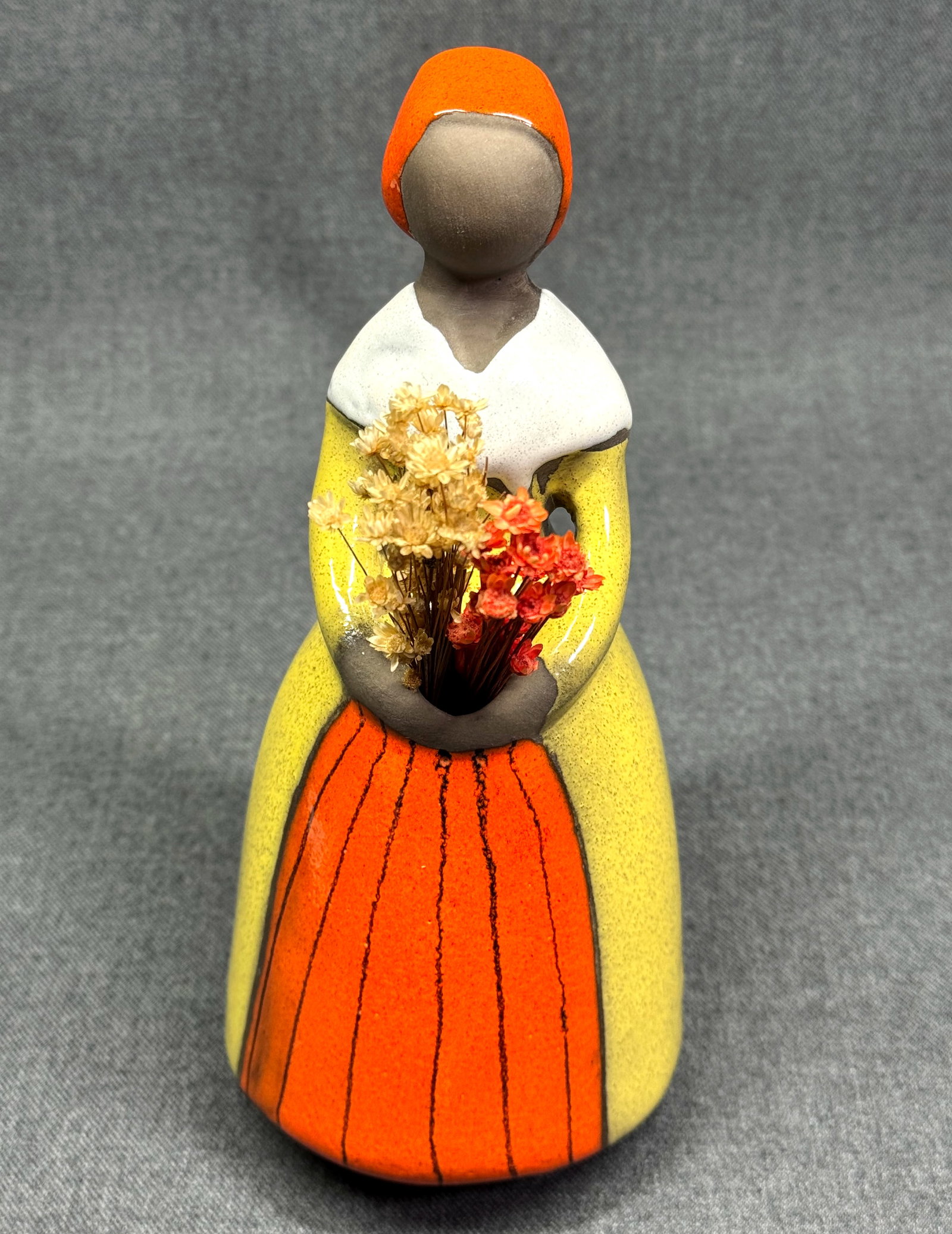 Vintage MCM Jie Gantofta Sweden Elsi Bourelius Ceramic Figurine Bud Vase. *J: Vintage Jie Gantofta Sweden Elsi Bourelius Ceramic Flower Girl Figurine Bud Vase. With Paper Label & Dried Flowers. For measures please refer to the pictures taken with a measuring tape. Weight: Grams