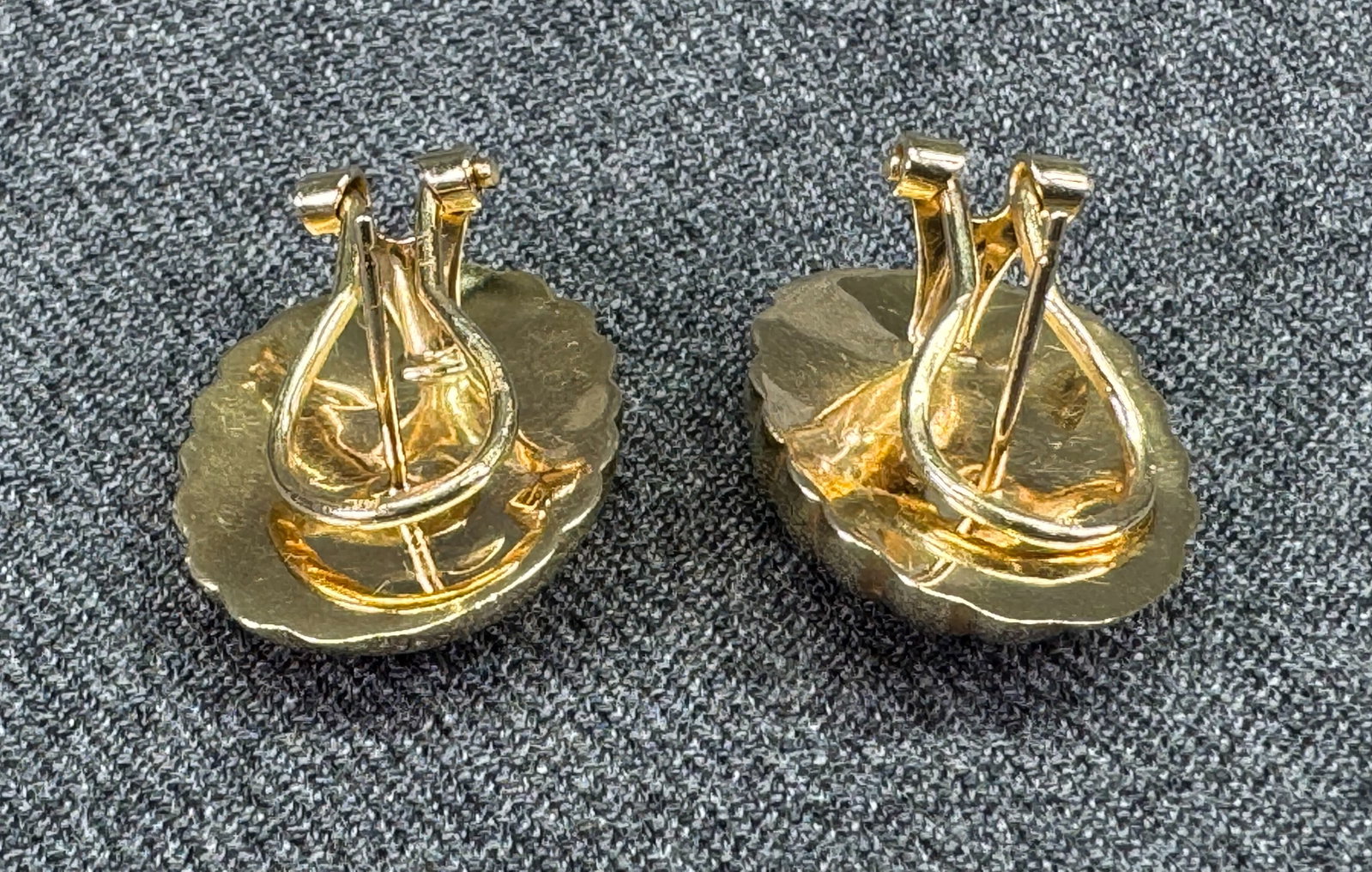 Solid 14K Gold Omega Back Earrings 3.69 Grams - For Repair or Gold Scrap. *J: Solid 14K Gold Omega Back Earrings 3.69 Grams - For Repair or Gold Scrap. Marked on the back of the hinge and on the studs. For measures please refer to the pictures taken with a measuring tape. Weigh
