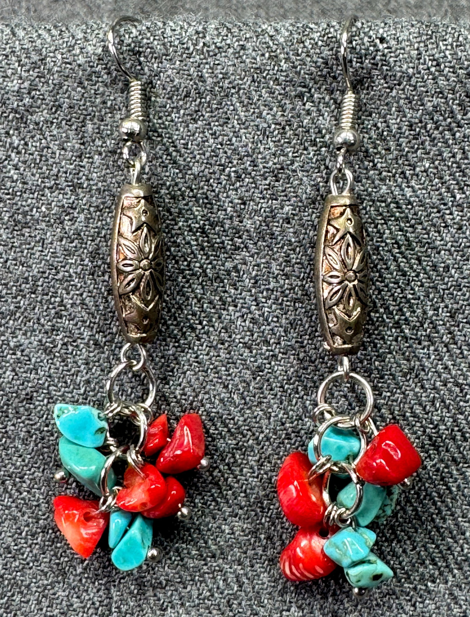 Vintage southwestern style metal bead with dangles hook earrings #a: Vintage southwestern style silver-toned metal bead with turquoise & coral resin nuggets dangles hook earrings. Unmarked. For measures please refer to the pictures taken with a measuring tape. Weight: 