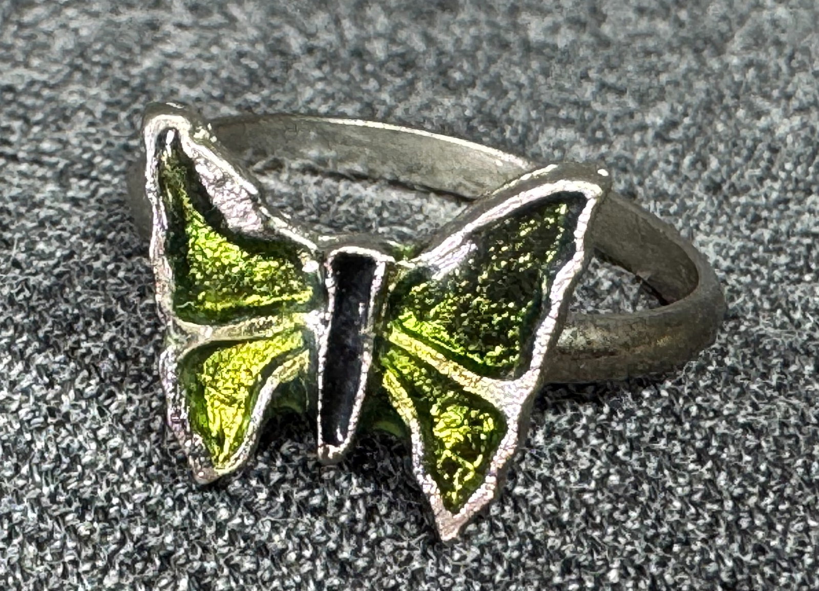 Vintage enamel silver-toned metal butterfly adjustable ring. #a: Vintage enamel silver-toned metal butterfly adjustable ring.. Unmarked. For measures please refer to the pictures taken with a measuring tape. Weight: 2 Grams. IN HOUSE FLAT SHIPPING & HANDLING COST W