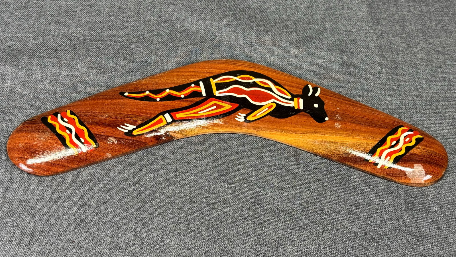 Australian Boomerang Carved and painted wood. *c: Australian Boomerang Carved and painted wood. For measures please refer to the pictures taken with a measuring tape. IN HOUSE FLAT SHIPPING & HANDLING COST WITHIN ALL THE U.S. : $12 To bypass LiveShip