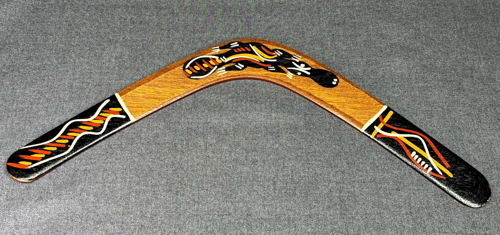 Australian Boomerang Carved and painted wood. *c: Australian Boomerang Carved and painted wood. For measures please refer to the pictures taken with a measuring tape. IN HOUSE FLAT SHIPPING & HANDLING COST WITHIN ALL THE U.S. : $12 To bypass LiveShip