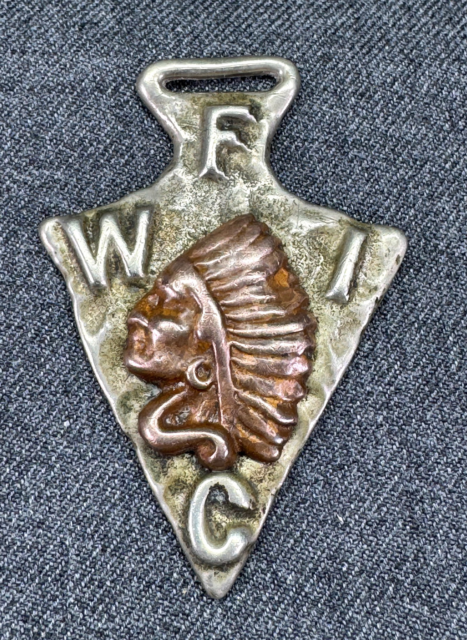 Antique FCWI Native American Chief Arrowhead Watch Fob . Silver-toned and copper. V: IN HOUSE FLAT SHIPPING & HANDLING COST WITHIN ALL THE U.S. : 7 To bypass LiveShipping, and use our In-House shipping service for 7 or shipping combined for multiple lots, please select “Arrange 