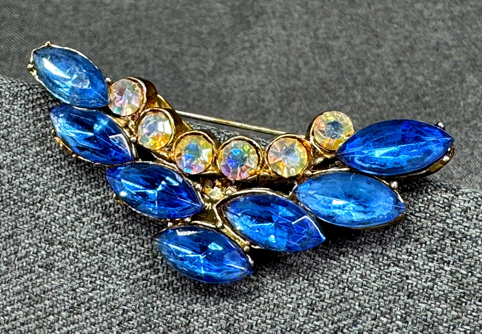 Vintage Blue & AB Crystals Crescent Brooch Pin. Crimped Bezel Open Back, Gold-tone. *h: Vintage Blue & AB Crystals Crescent Brooch Pin. Crimped Bezel Open Back, Gold-tone. Unmarked For measures please refer to the pictures taken with a measuring tape. Weight: 14 Grams. IN HOUSE FLAT SHIP