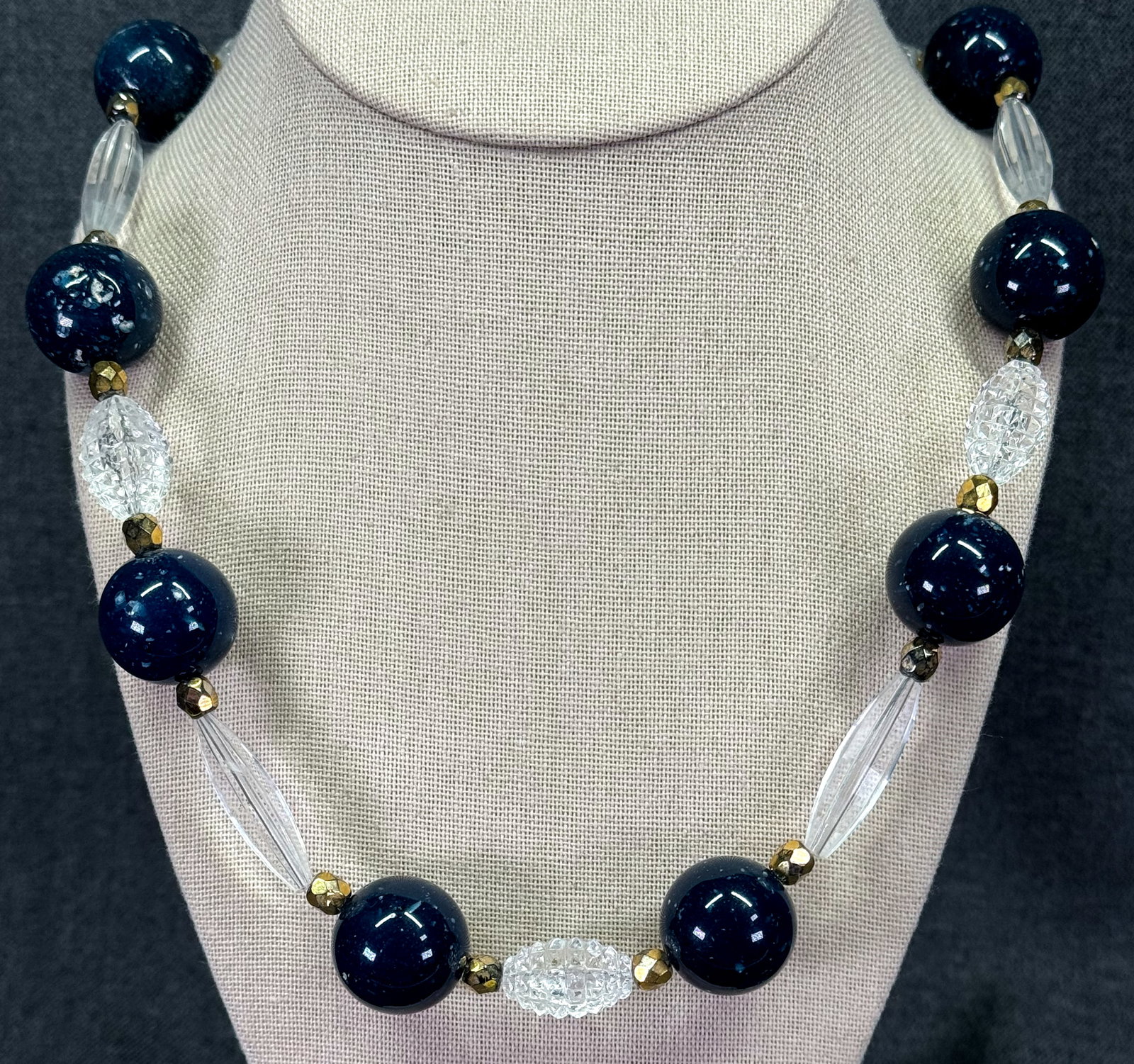 Vintage clear and blue lucite & golden crystals beads necklace.: Vintage clear and blue lucite & golden crystals beads necklace. Wire string. Unmarked. For measures please refer to the pictures taken with a measuring tape. Weight: 72 Grams. IN HOUSE FLAT SHIPPING &