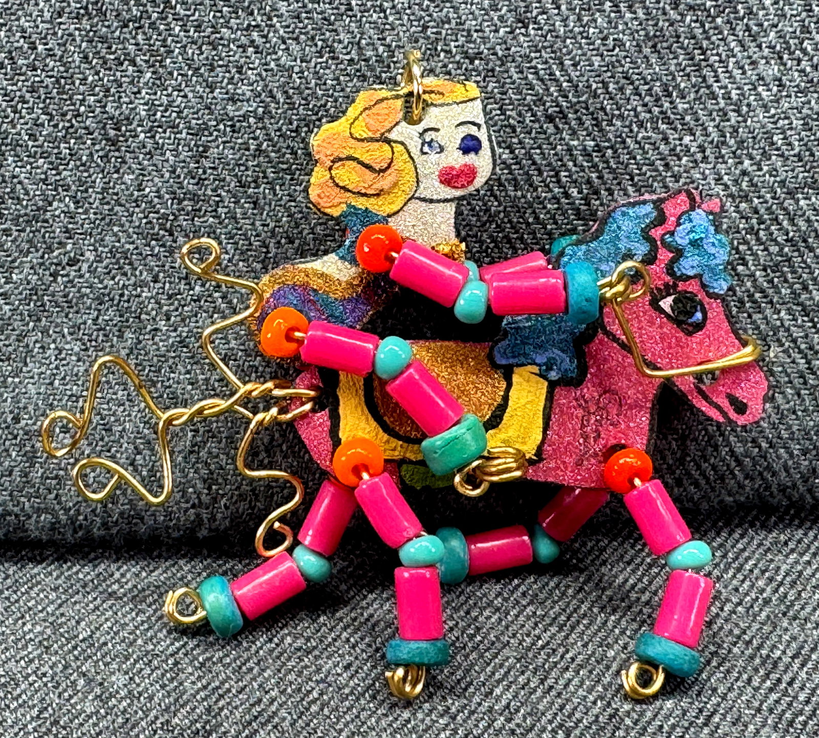 Vintage artist hand painted celluloid & wire horse woman working pendant. Signed. V: IN HOUSE FLAT SHIPPING & HANDLING COST WITHIN ALL THE U.S. : 7 To bypass LiveShipping, and use our In-House shipping service for 7 or shipping combined for multiple lots, please select “Arrange 
