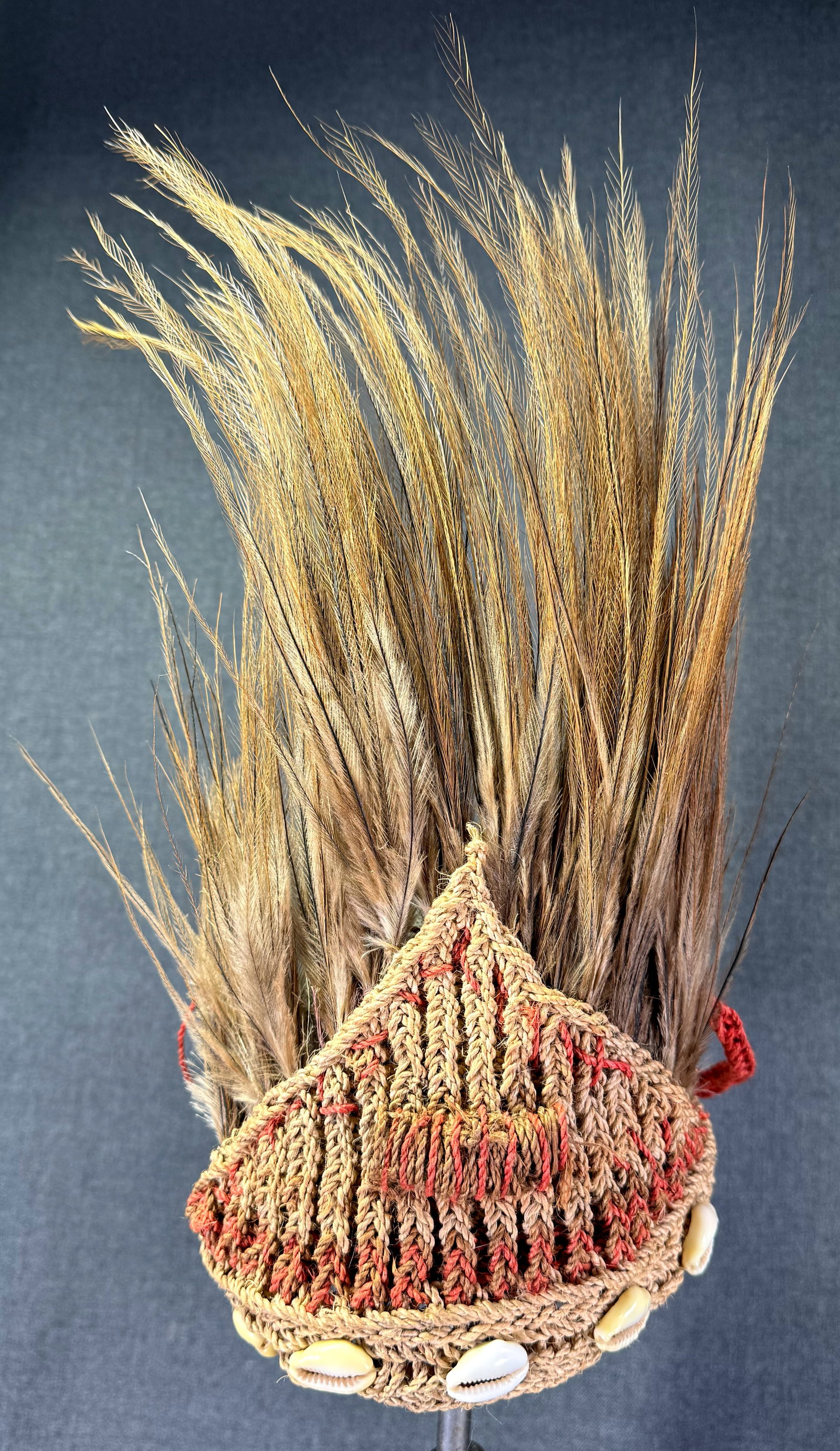 Papua New Guinea Headdress.: Papua New Guinea Headdress. Cassowary feathers, nasa shells, fibers. For measures please refer to the pictures taken with a measuring tape. IN HOUSE FLAT SHIPPING & HANDLING COST WITHIN ALL THE U.S. :