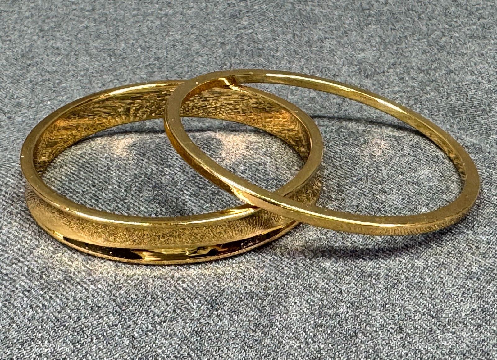 Vintage Monet Signed Gold-tone Bangle Bracelets. Set of 2. *L: Vintage Monet Signed Gold-tone Bangle Bracelets. Set of 2. . Signed. For measures please refer to the pictures taken with a measuring tape. Weight: 25 Grams. IN HOUSE FLAT SHIPPING & HANDLING COST WIT