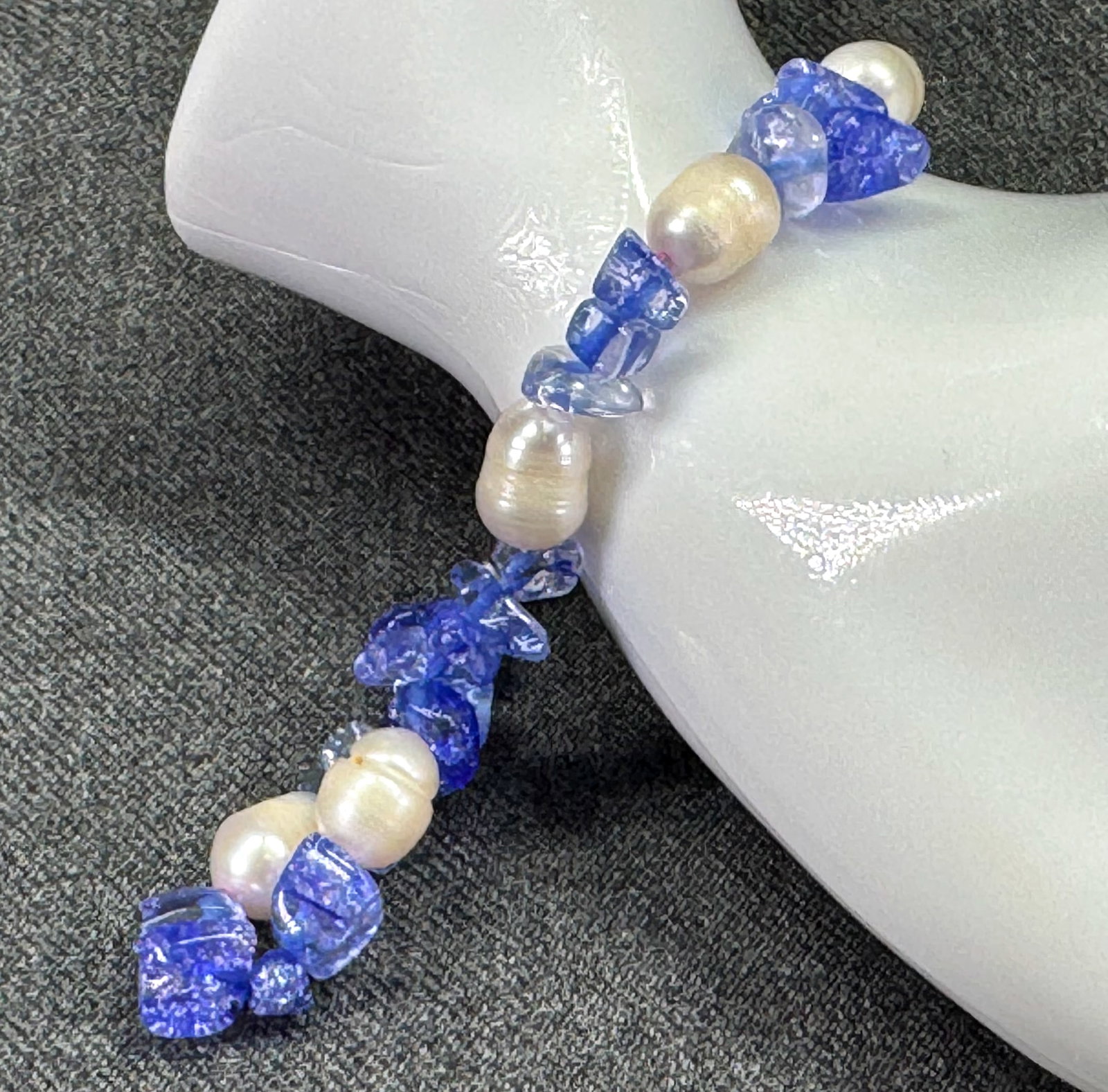Handcrafted Artisan Freshwater Baroque Pearl & Blue Gemstone Chip Bracelet. *L: Handcrafted Artisan Freshwater Baroque Pearl & Blue Gemstone Chip Bracelet. Silver-tone. Unmarked For measures please refer to the pictures taken with a measuring tape. Weight: 14 Grams. IN HOUSE FLAT