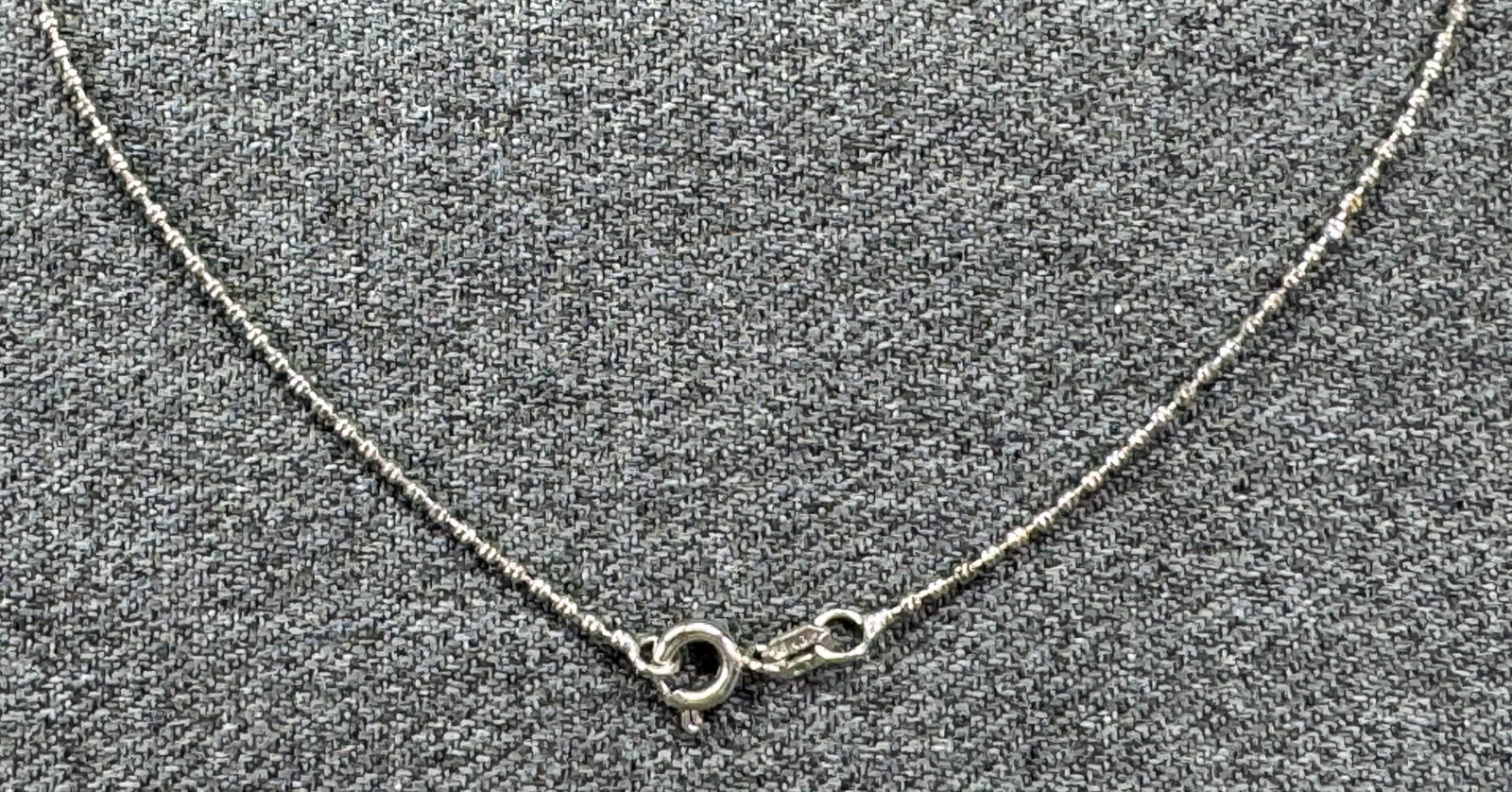 Vintage 18K White Gold-plated Faceted Bead Chain Necklace. *L: Vintage 18K White Gold-plated Faceted Bead Chain Necklace. Marked 18KGP. For measures please refer to the pictures taken with a measuring tape. Weight: 3 Grams. IN HOUSE FLAT SHIPPING & HANDLING COST 