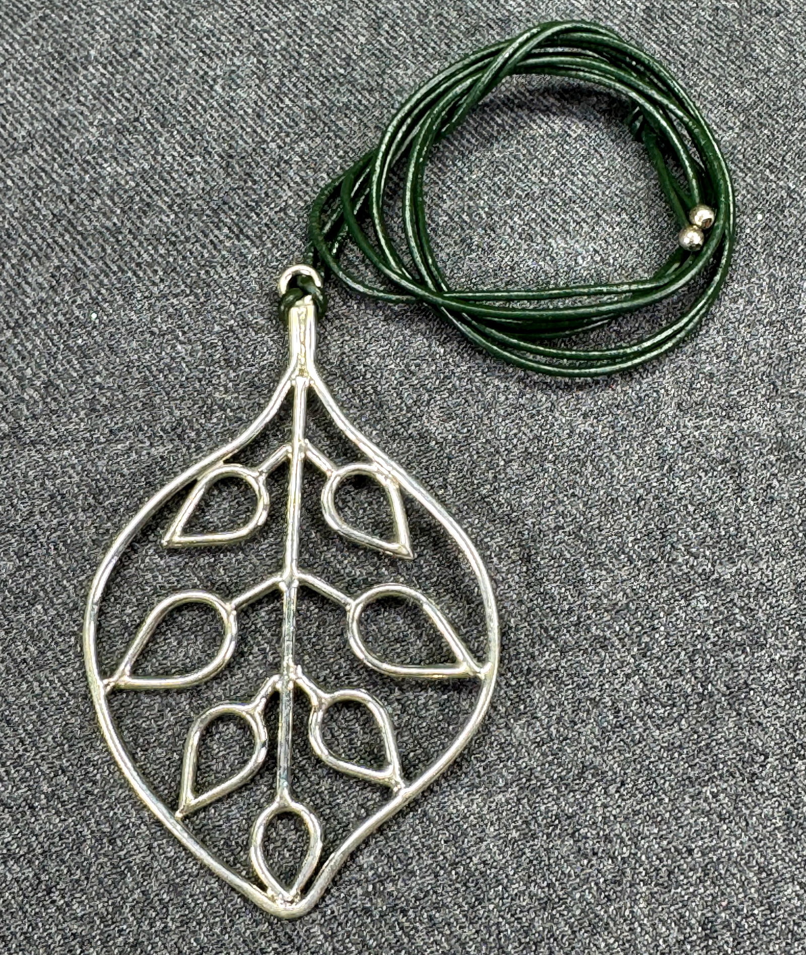 Vintage Artisan Sterling Silver Openwork Leaf Pendant. Green Leather Cord. *K