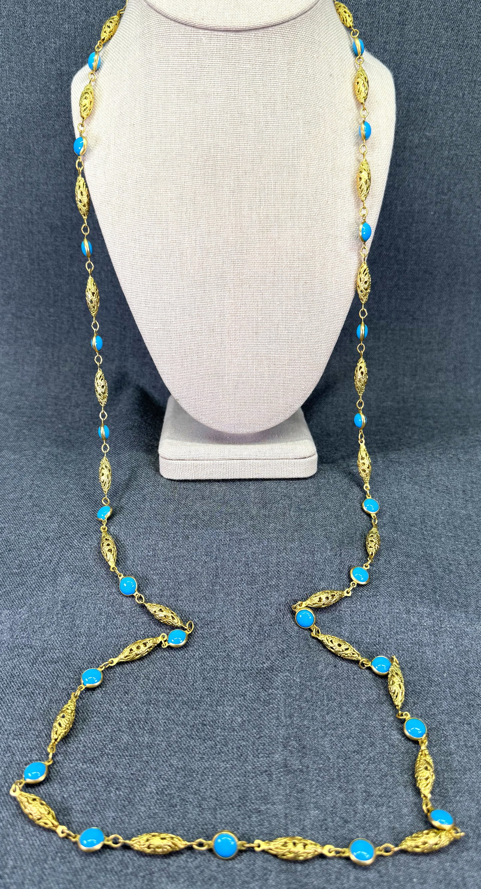Vintage Art Deco Revival Flapper Sautoir Necklace. Bezel Set Glass, Filigree Gold-tone. *g: Vintage Art Deco Revival Flapper Sautoir Necklace. Bezel Setting Turquoise Glass, filigree floral gold-tone links. Unmarked. For measures please refer to the pictures taken with a measuring tape. Weig