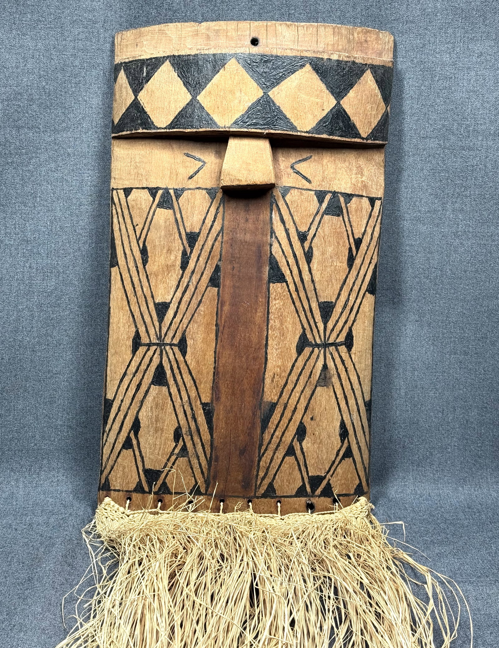 Amazonian Mehinaku Ritual Mask. Carved hardwood, vegetal pigments paint, fibers. (1 of 9)