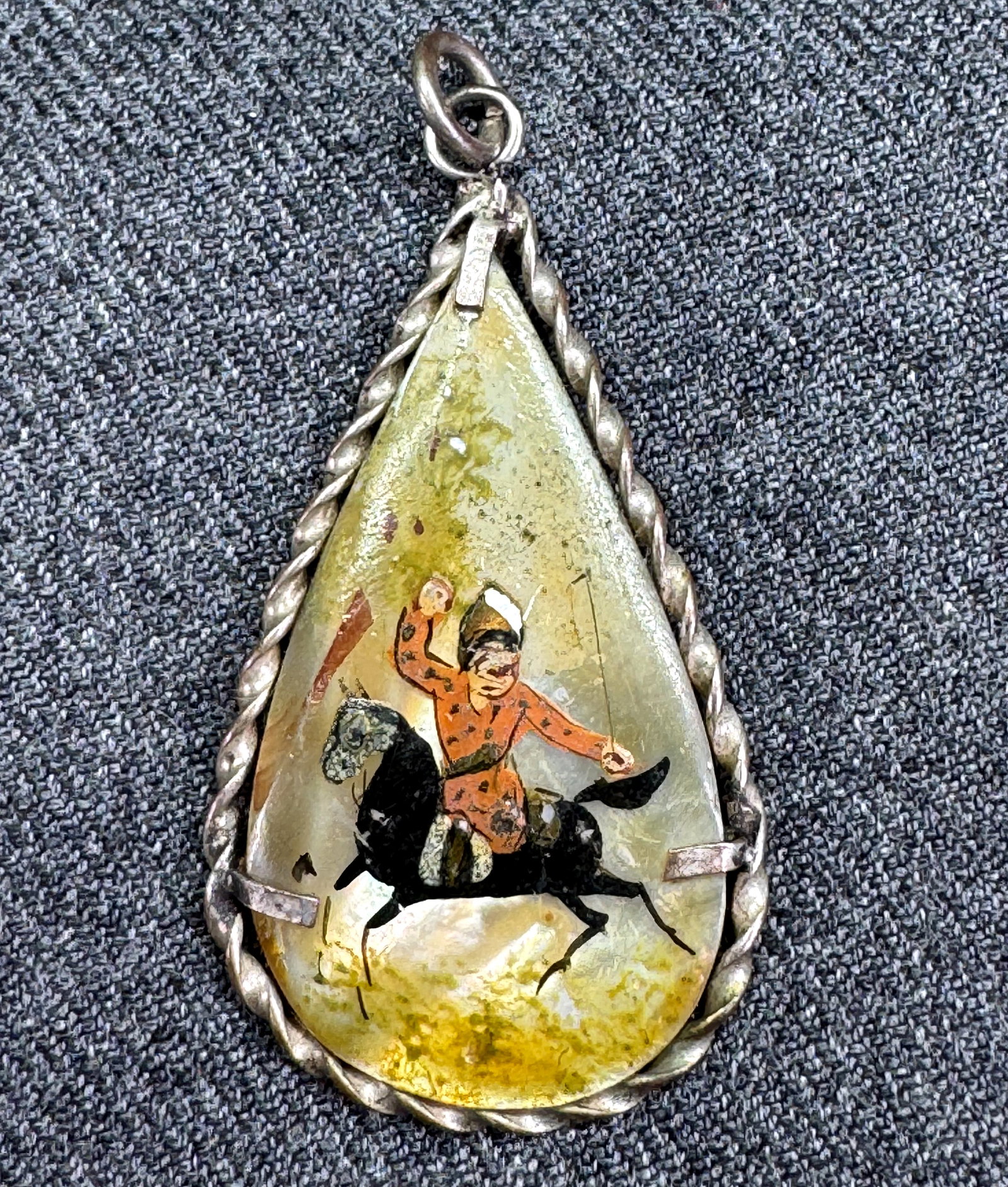 Vintage Persian Hand Painted Mother of Pearl Pendant. Equestrian & Songbirds *i: Vintage Persian Hand Painted Mother of Pearl Storyteller Pendant. Equestrian & Songbirds. Woven Silver-tone setting. Unmarked. For measures please refer to the pictures taken with a measuring tape. We