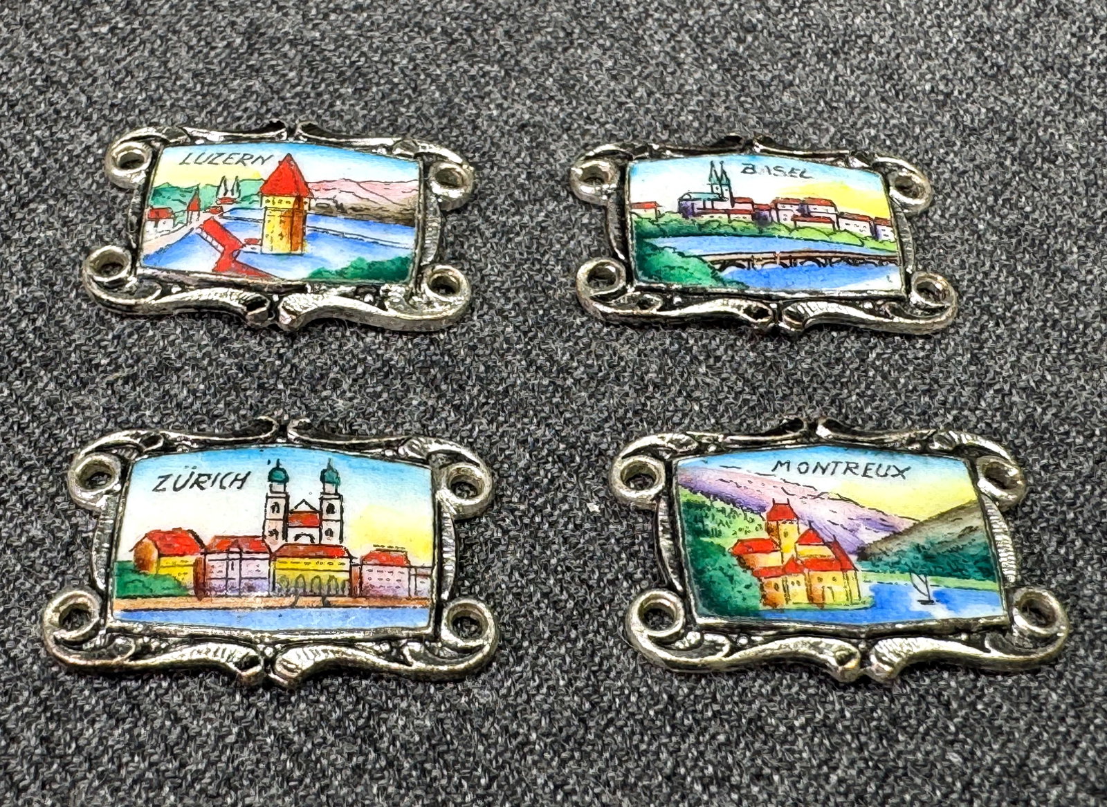 Vintage hand painted enamel Swiss souvenir miniature panels. Silver-toned. Lot of 4. *e