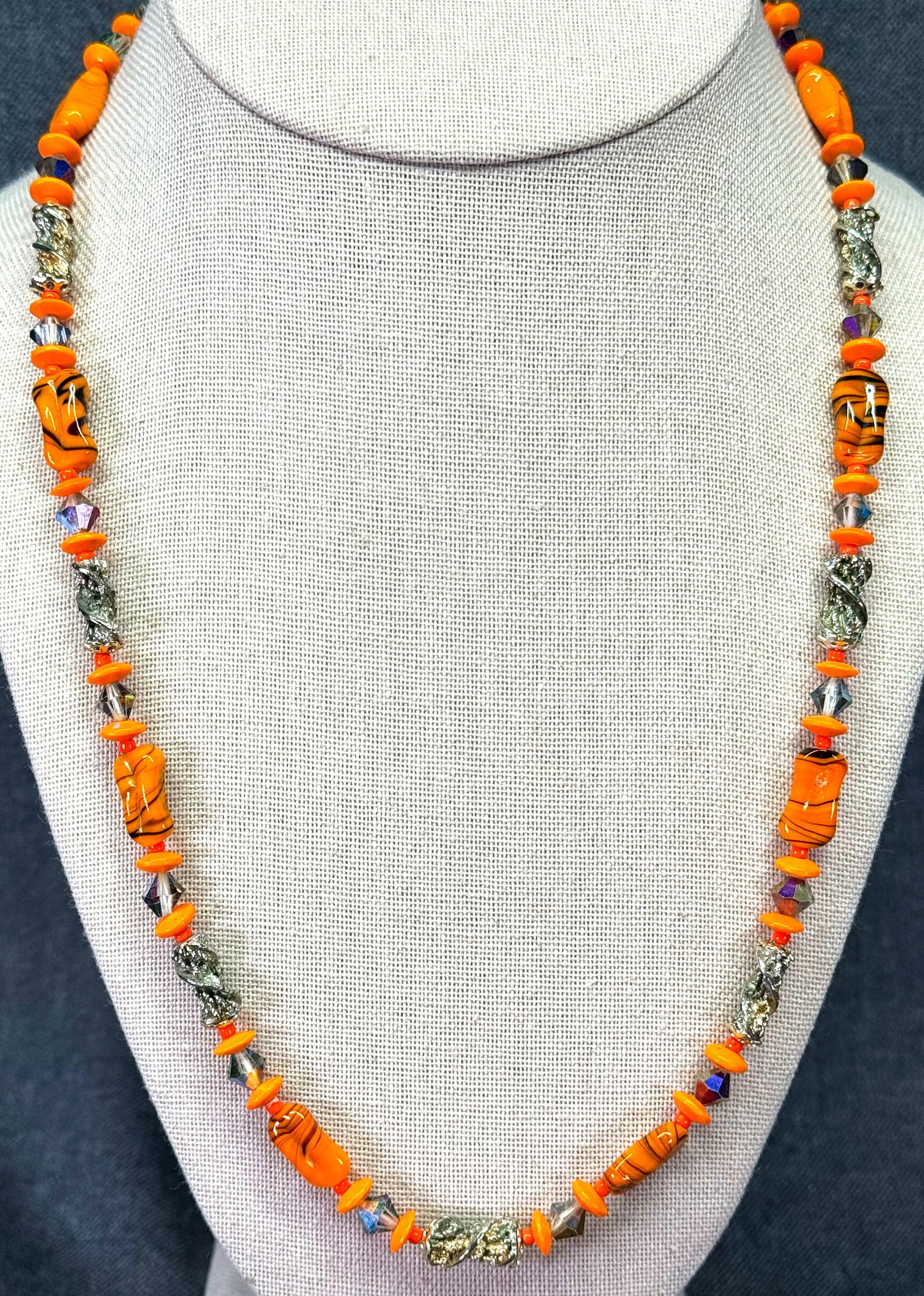 Vintage orange glass, AB crystal & gold-toned metal beads necklace.