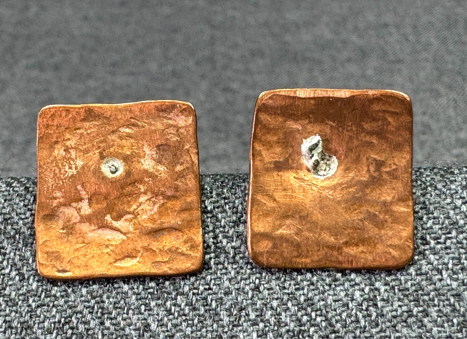 Artisan crafted silver spot hammered copper stud earrings
