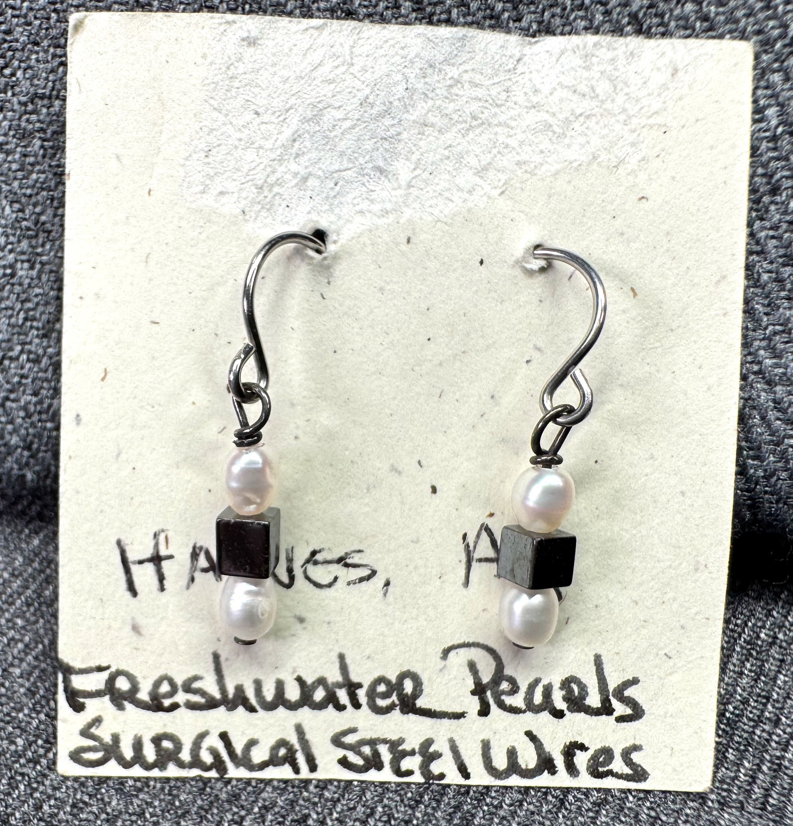Vintage Alaskan freshwater pearls, hematite surgical steel hook earrings: Vintage Alaskan freshwater pearls, hematite surgical steel hook earrings. Unused in card. Unmarked. For measures please refer to the pictures taken with a measuring tape. Weight: 2 Grams . IN HOUSE FL