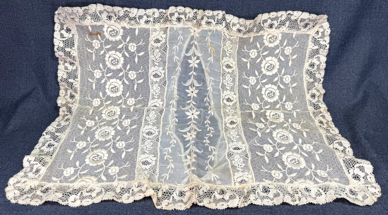 Antique floral Normandy lace pillow cover . 17 1/2 x 14 1/2 inches *a: Antique floral Normandy lace pillow cover . 17 1/2 x 14 1/2 inches. For measures please refer to the pictures taken with a measuring tape. Weight: 25 Grams. IN HOUSE FLAT SHIPPING & HANDLING COST WITH