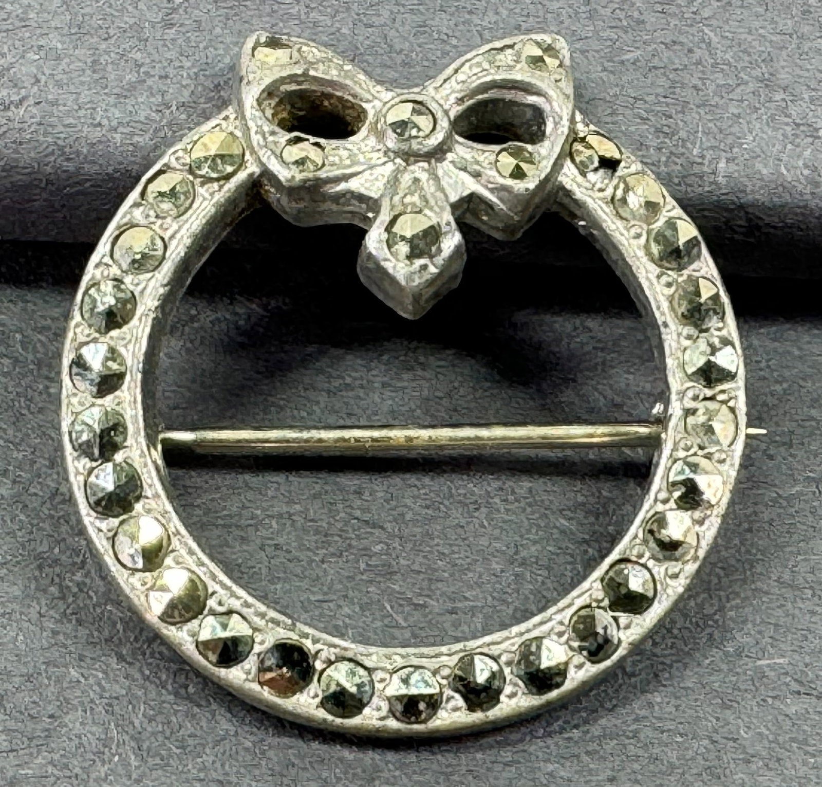 Antique art deco jeweled marcasites pewter small wreath with bow brooch.