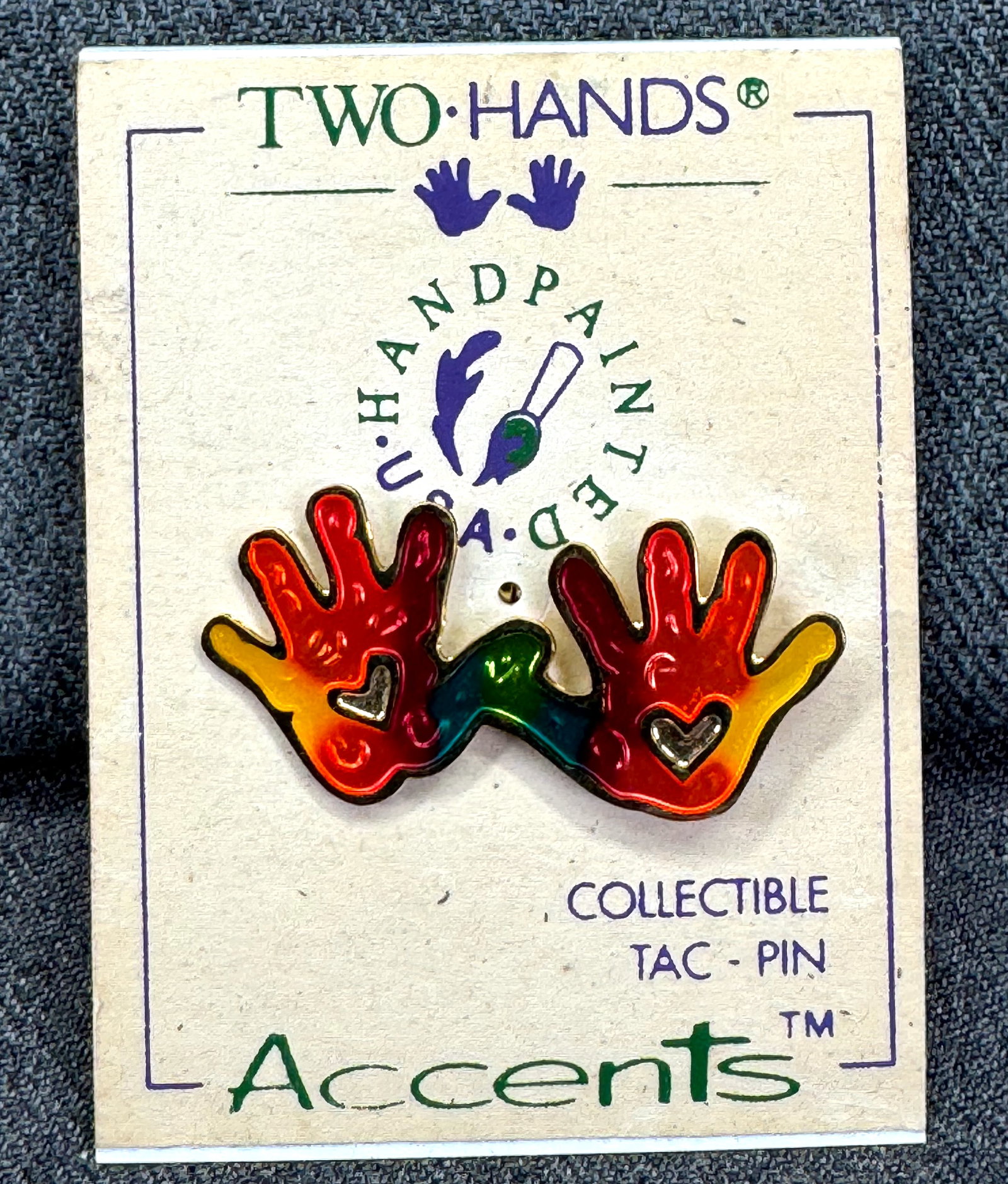 Vintage Two - Hands enamel gold-toned tac pin. *a: Vintage Two-Hands enamel gold-toned tac pin. Unused in card. For measures please refer to the pictures taken with a measuring tape. Weight: 6 Grams. IN HOUSE FLAT SHIPPING & HANDLING COST WITHIN ALL T