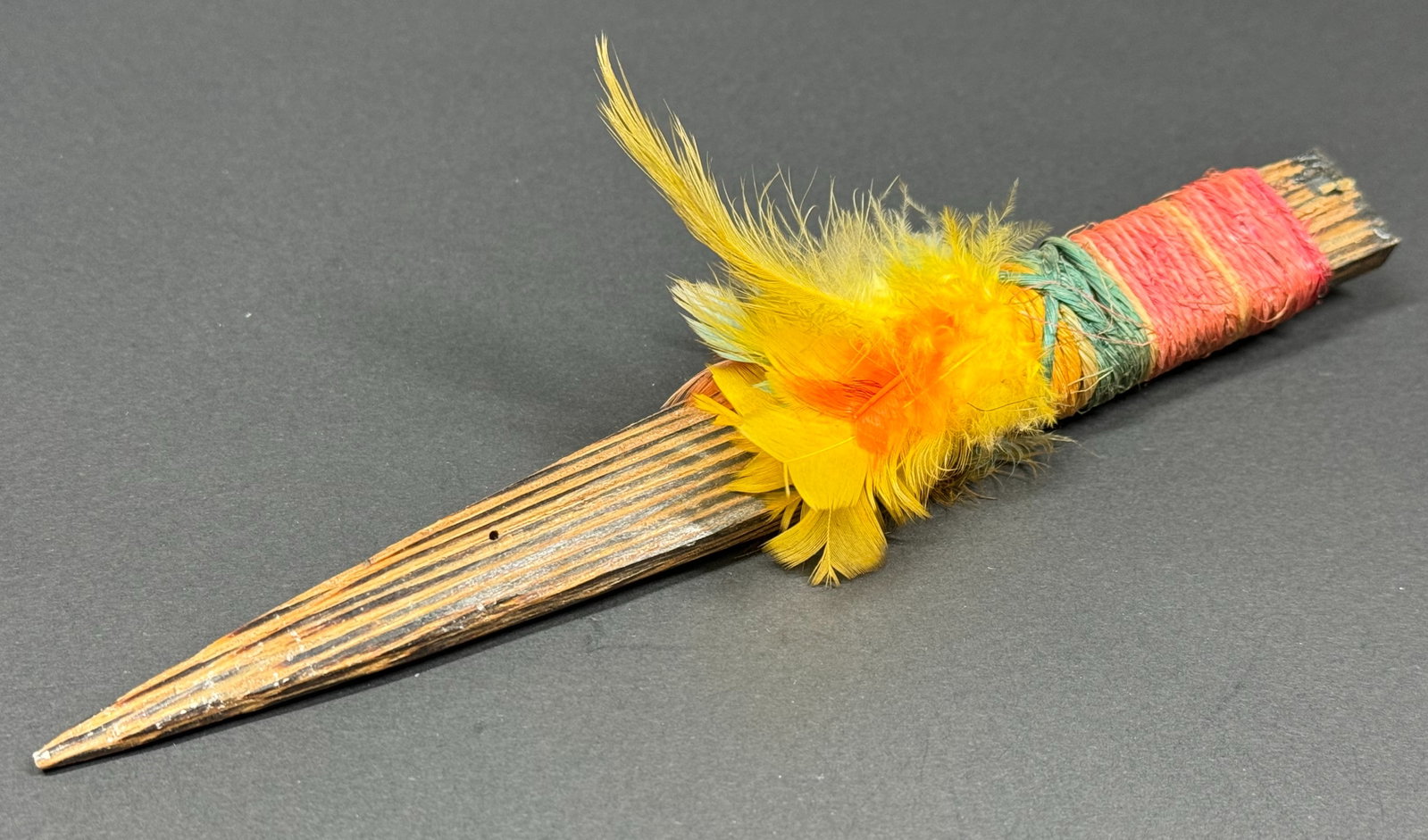 Amazonian Shuar Dagger. Chonta wood, fibers, feathers.