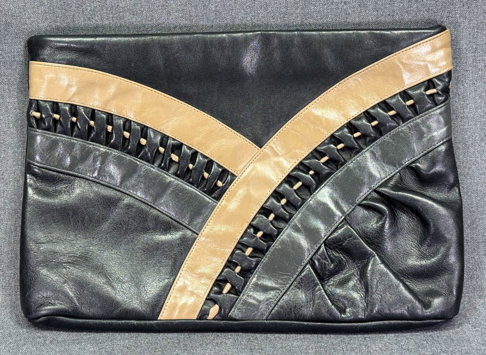Vintage 1980s Genuine Leather Patchwork Clutch . Black, Gray & Beige with Woven Accents. *M: Vintage 1980s Black, Gray & Beige Genuine Leather Patchwork Clutch with Woven Accents. Unmarked. The interior is beige Grosgrain fabric with a zippered pocket (stains). For measures please refer to th