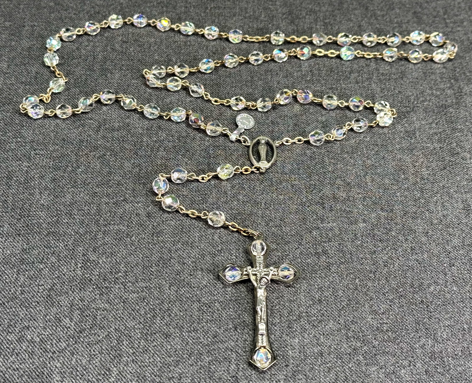 Vintage Italian AB Faceted Glass Crystal Bead Rosary. Jeweled Crucifix. Extra Srong. *M: Vintage Italian AB Faceted Glass Crystal Bead Rosary. Jeweled Crucifix. Virgin Mary medallion. Silver-tone. Extra Srong tag. Marked. For measures please refer to the pictures taken with a measuring ta