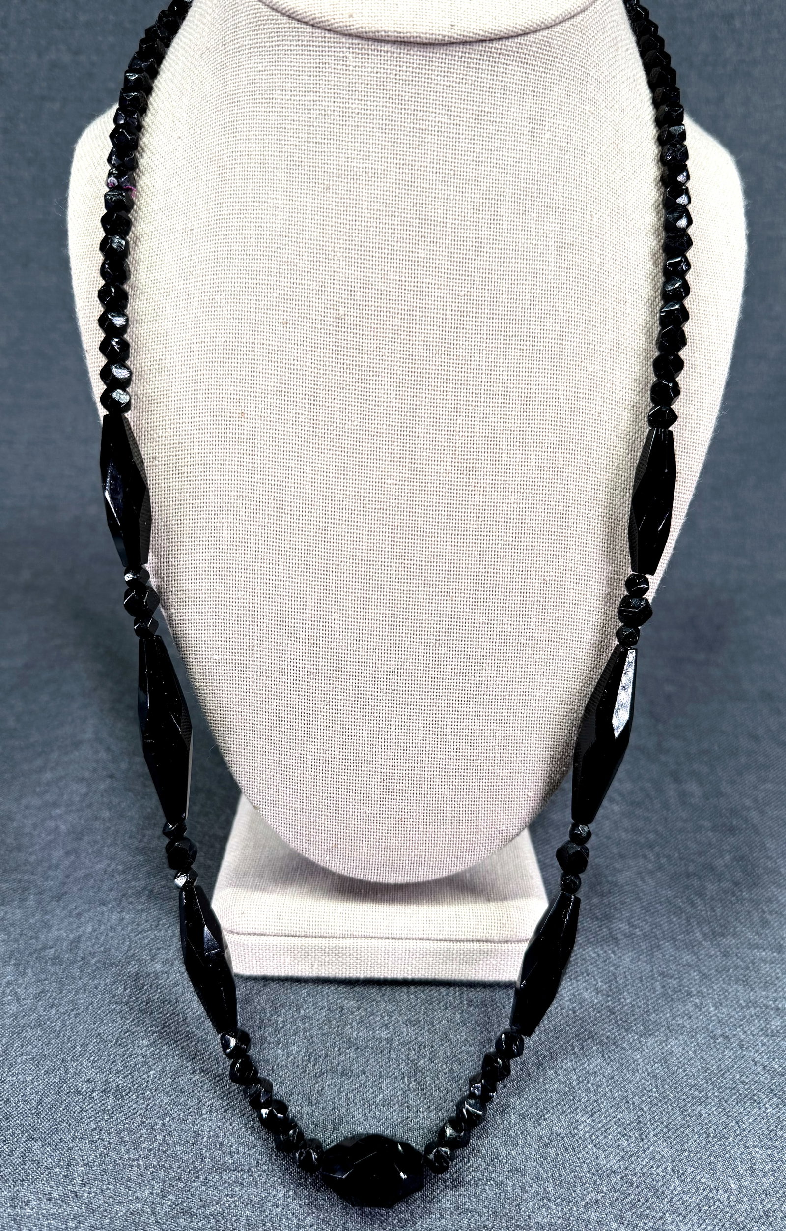 Antique Edwardian mourning black glass faceted bead necklace. *M: Antique Edwardian mourning black glass faceted bead necklace. No clasp. Unmarked. For measures please refer to the pictures taken with a measuring tape. Weight: 48 Grams. IN HOUSE FLAT SHIPPING & HAND