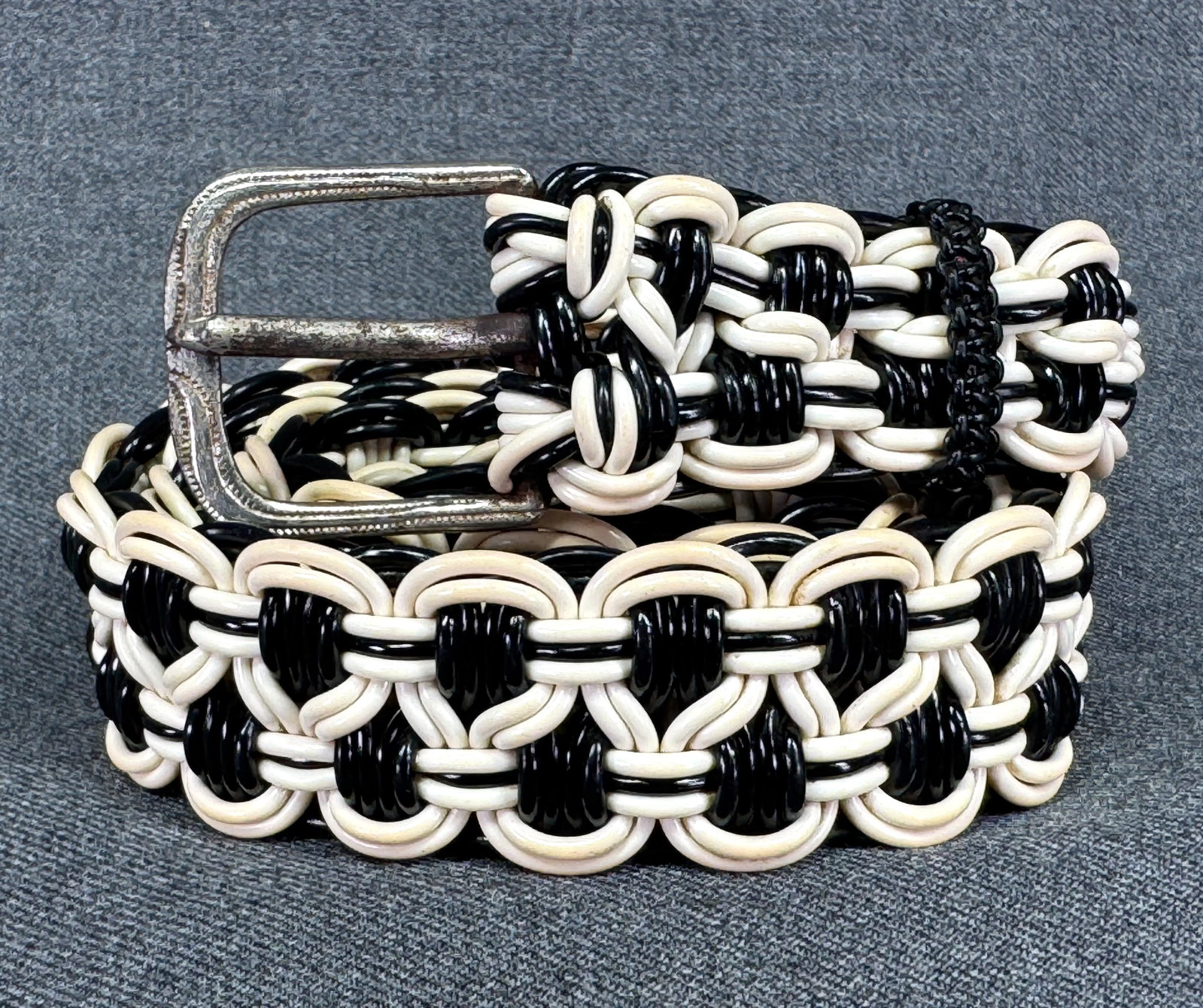 Vintage 1940s Gimp Cord Handcrafted Macrame Black & Creamy Belt. *M: Vintage 1940s Gimp Cord Handcrafted Macrame Black & Creamy Belt. Silver-tone buckle. Unmarked. Strap measures 31 inches long end to end , not considering the buckle. For measures please refer to the p