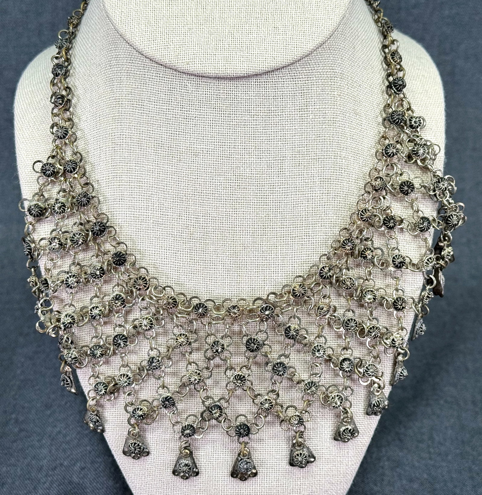 Vintage Egyptian Revival Silver-tone Filigree Floral Bib Necklace. *h: Vintage Egyptian Revival Silver-tone Filigree Floral Bib Necklace. Unmarked. For measures please refer to the pictures taken with a measuring tape. Weight: 50 Grams. IN HOUSE FLAT SHIPPING & HANDLING 
