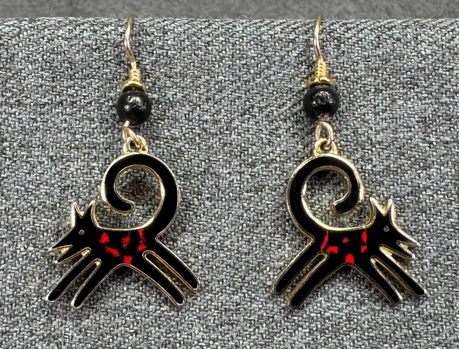 Vintage Laurel Burch Felicity Wild Dog Hook Earrings. Retired. *J: Vintage Laurel Burch Felicity Wild Dog Hook Earrings. Retired. Enamel, Gold-tone. For measures please refer to the pictures taken with a measuring tape. Weight: 6 Grams. IN HOUSE FLAT SHIPPING & HANDL