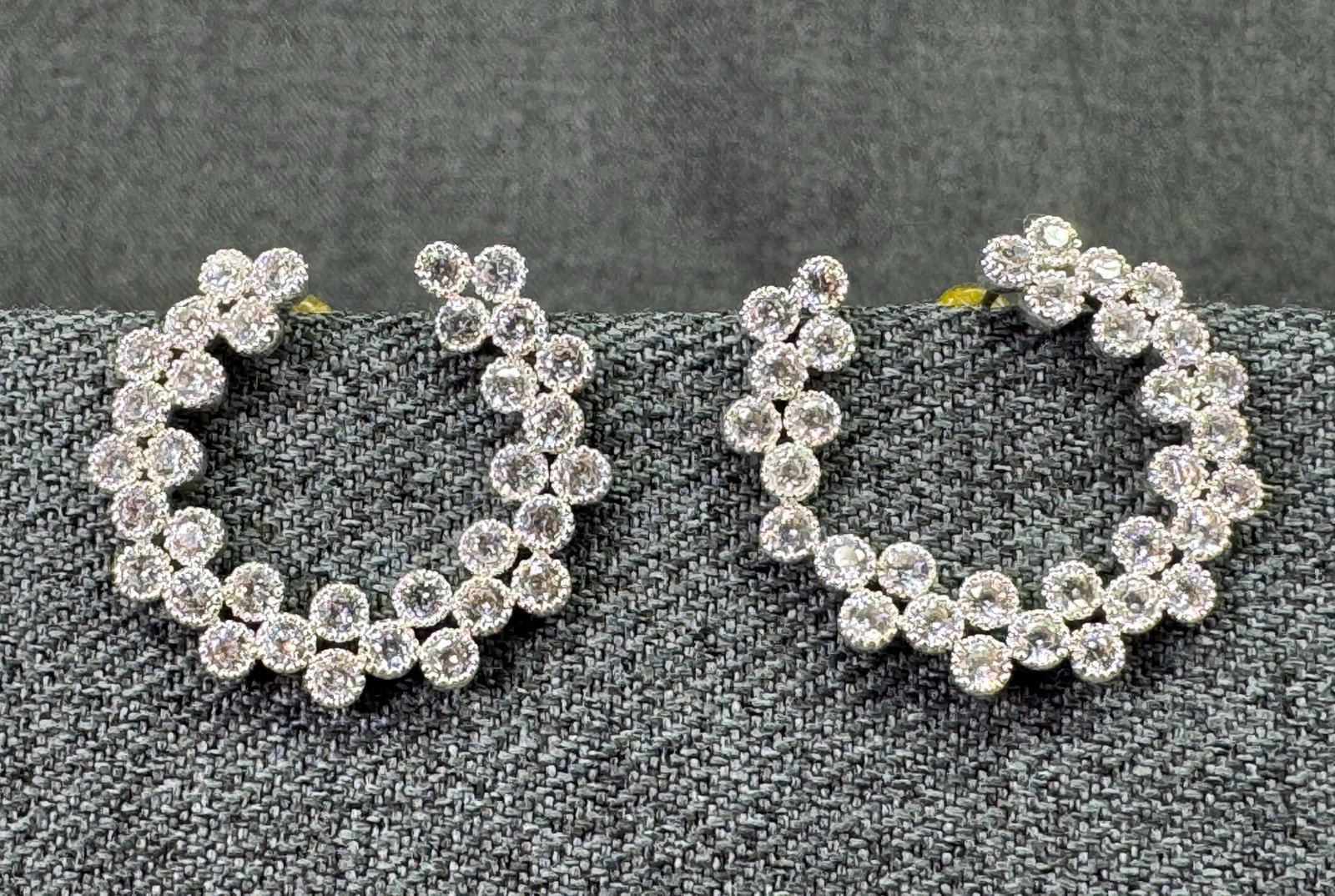 Clear Crystals Cluster C-Shaped Statement Stud Earrings. Silver-tone. 1v*h: Clear Crystals Cluster C-Shaped Statement Stud Earrings. Silver-tone. Unmarked . For measures please refer to the pictures taken with a measuring tape. Weight: 6 Grams. IN HOUSE FLAT SHIPPING & HANDLI