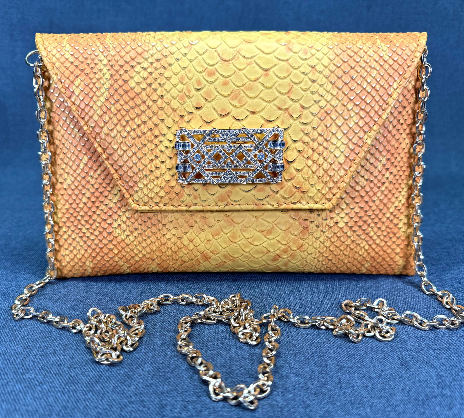 Merci New York for Madame Mathilde Jeweled Yellow Faux Python Clutch Purse . *J: Merci New York for Madame Mathilde Jeweled Egg Yolk Yellow with Golden Accents Plastic Faux Python Clutch Purse . Clear Crystals Filigree Gold-tone Applique. Detachable Chain Strap. The Merci New York