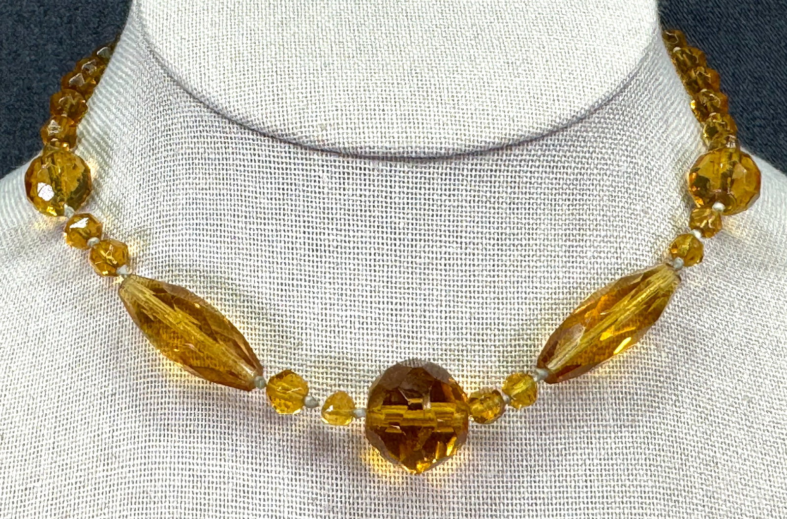 Antique art deco Czech amber color glass collar necklace. *d: Antique art deco Czech amber color glass collar necklace. Unmarked . For measures please refer to the pictures taken with a measuring tape. Weight: 22 Grams. IN HOUSE FLAT SHIPPING & HANDLING COST WIT