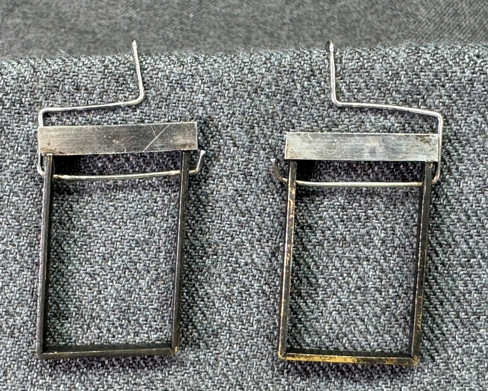 Vintage artsy constructivism silver-toned pierced earrings: Vintage artsy constructivism silver-toned pierced earrings. Unmarked. For measures please refer to the pictures taken with a measuring tape. Weight: 15 Grams IN HOUSE FLAT SHIPPING & HANDLING COST WIT