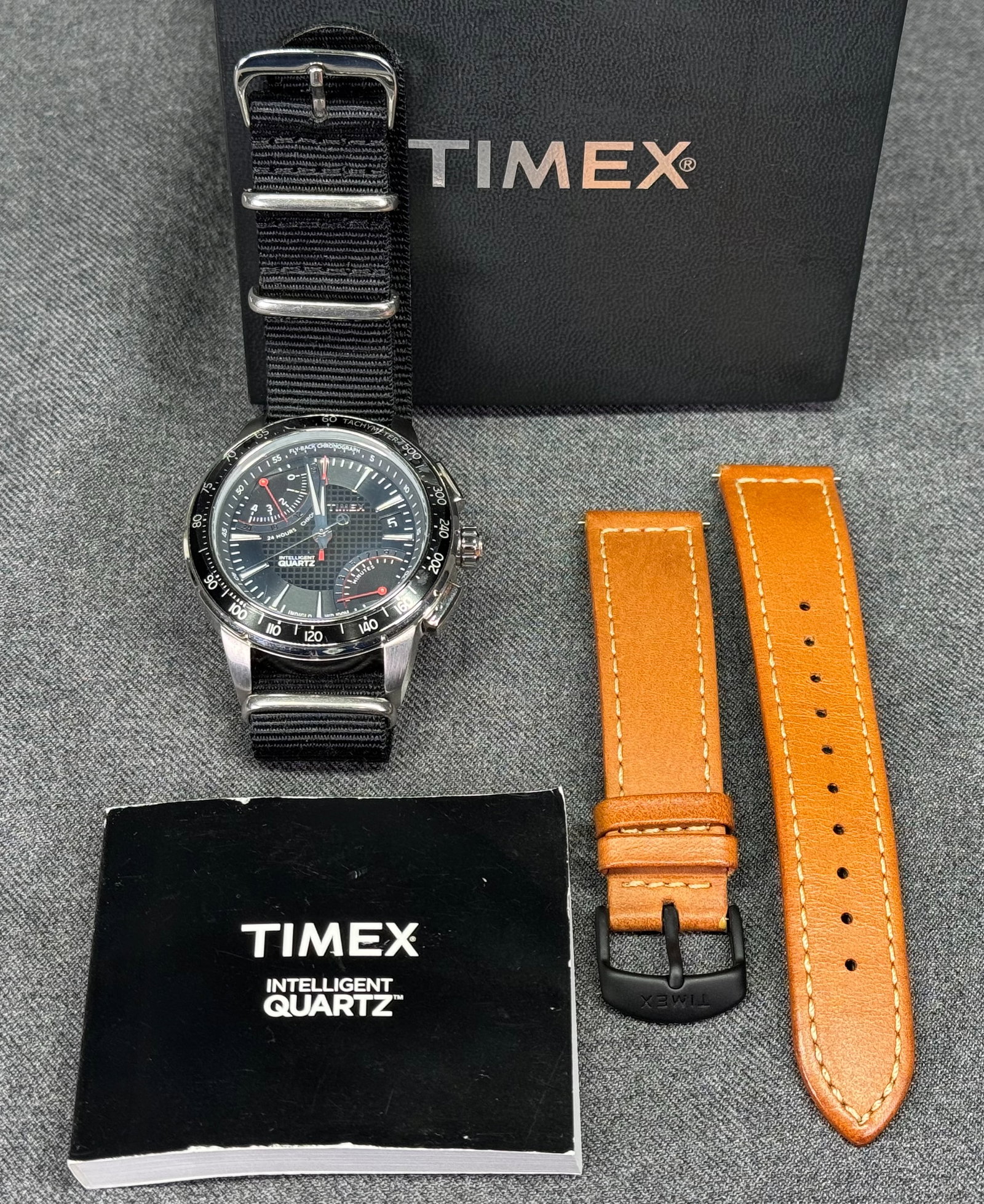 Unworn Timex Intelligent Quartz Fly Back Chronograph Watch: Unworn Timex Intelligent Quartz Fly Back Chronograph Watch Fly back Chronograph movement. Case width: 42 mm. Watch crystal still with protective film.(bear this in mind when you close up the photos). 